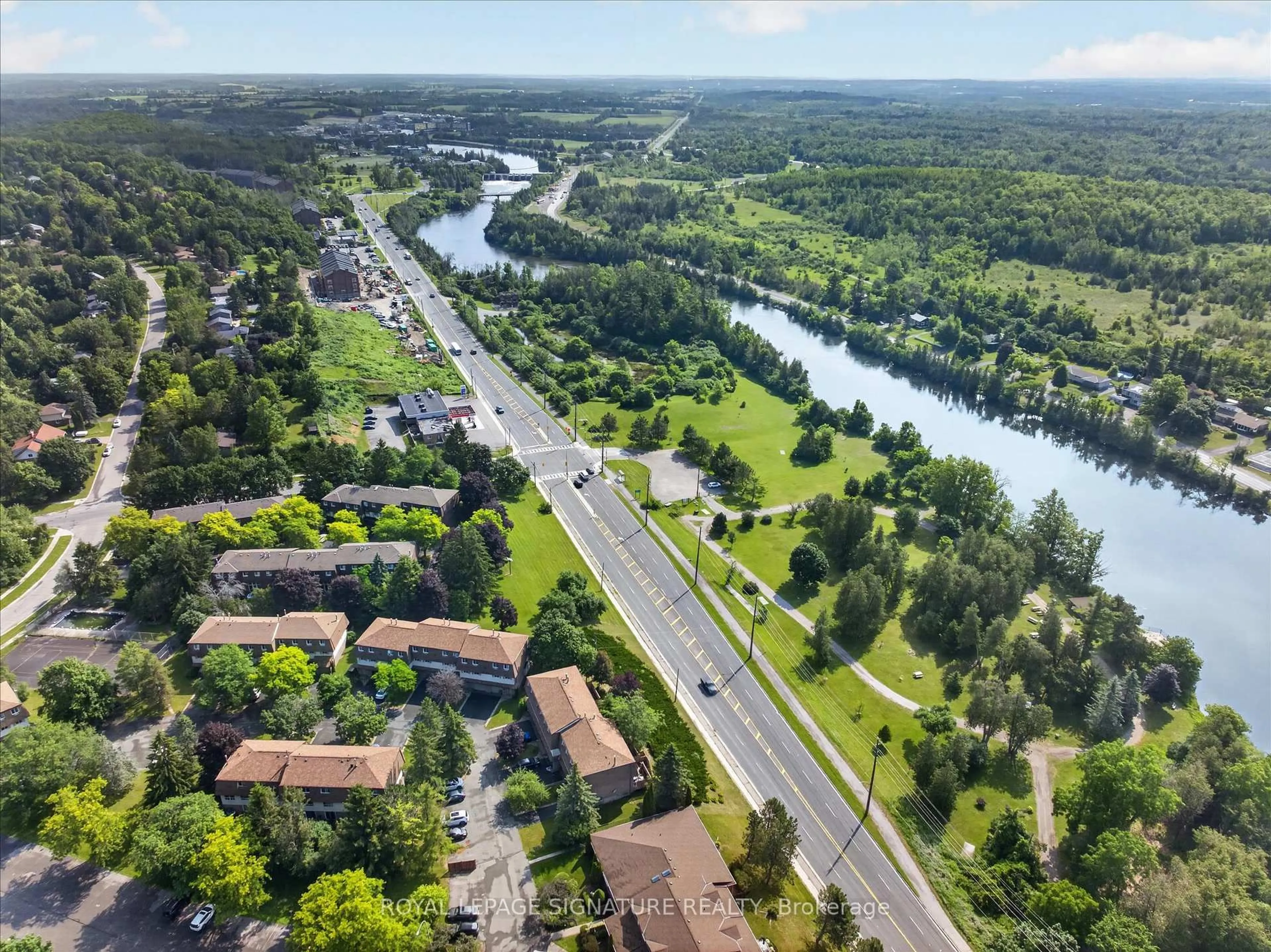 A pic from outside/outdoor area/front of a property/back of a property/a pic from drone, water/lake/river/ocean view for 30 CHAMPLAIN Cres #36, Peterborough Ontario K9L 1T1