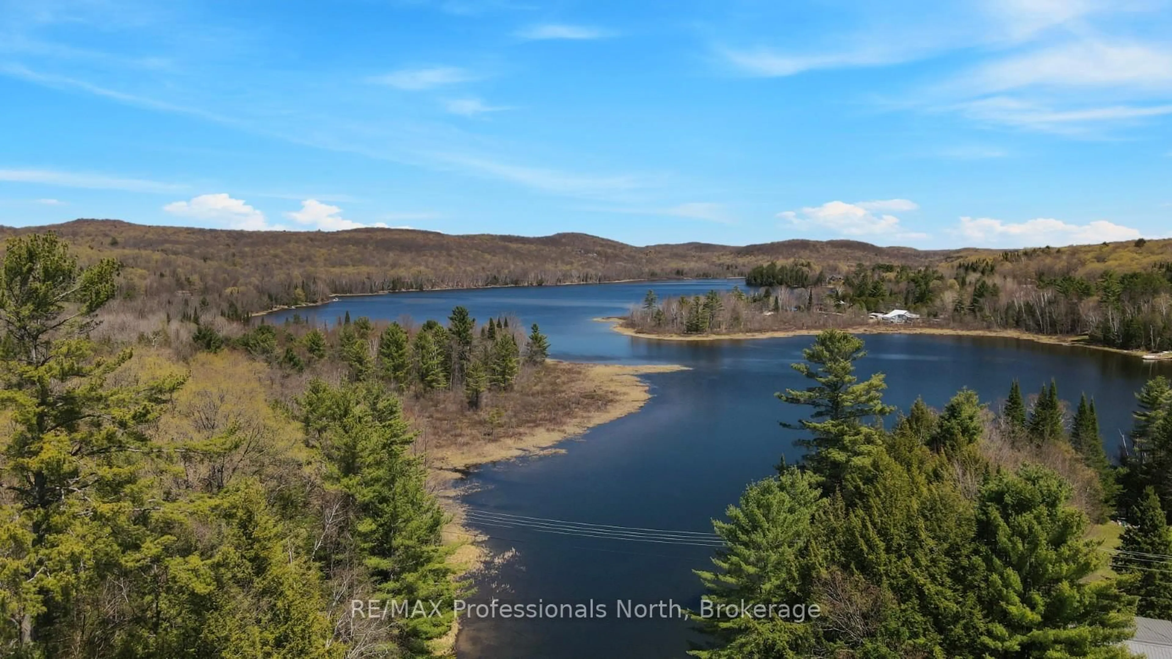 A pic from outside/outdoor area/front of a property/back of a property/a pic from drone, water/lake/river/ocean view for 1029 Cranberry Lake Rd, Dysart et al Ontario K0M 1S0