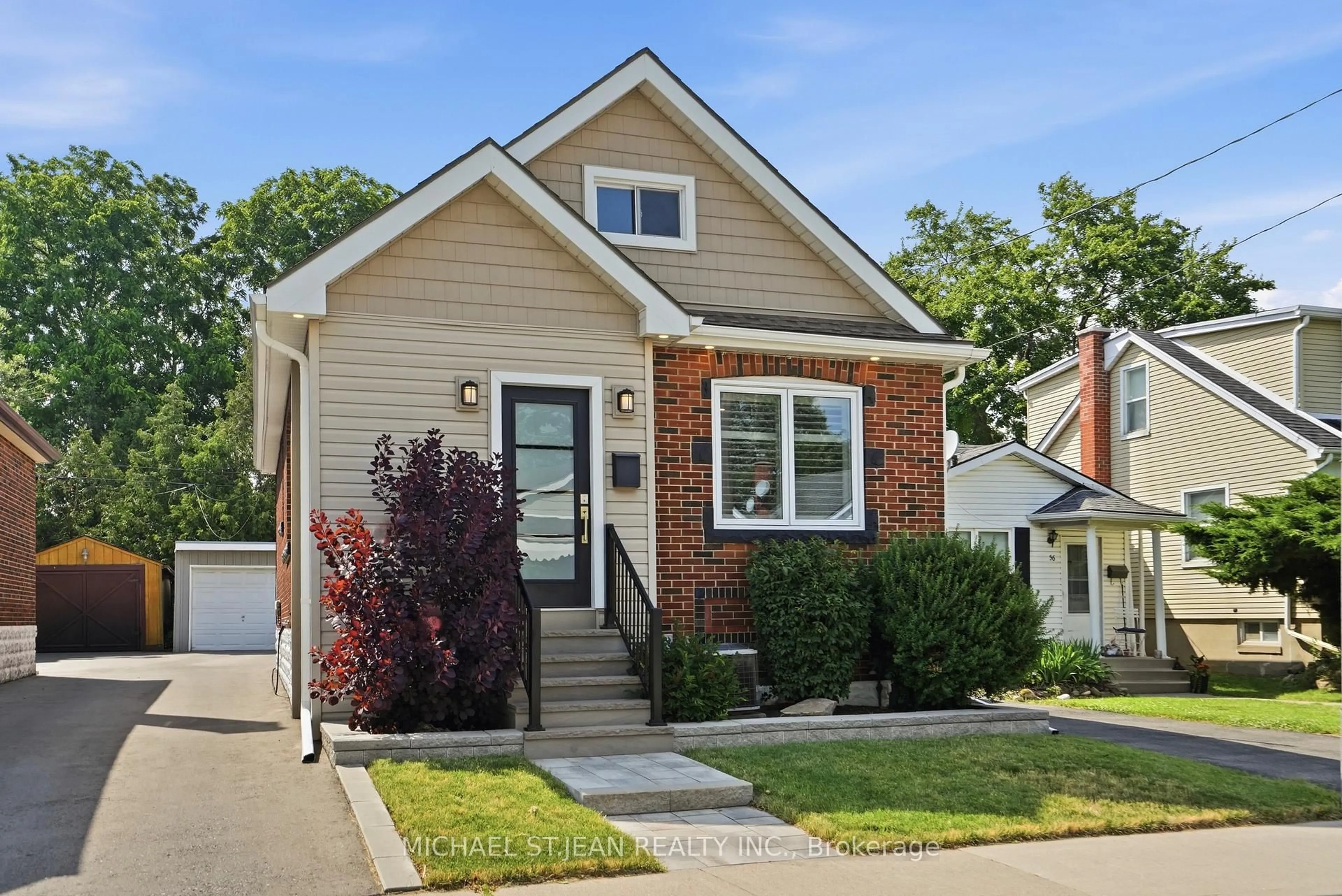 Home with brick exterior material, street for 58 Tragina Ave, Hamilton Ontario L8K 2Z3