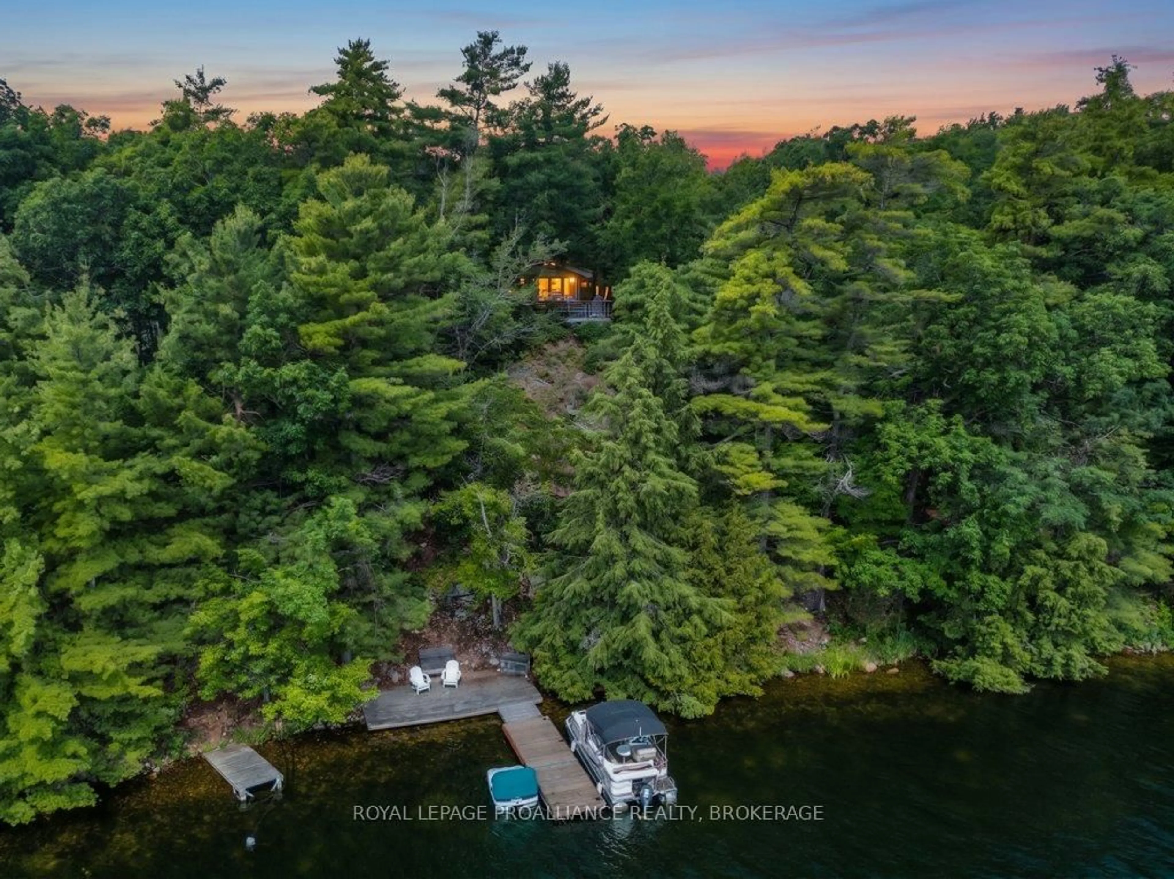 A pic from outside/outdoor area/front of a property/back of a property/a pic from drone, water/lake/river/ocean view for 811 Hermit Thrush Lane, Leeds and the Thousand Islands Ontario K0H 2N0