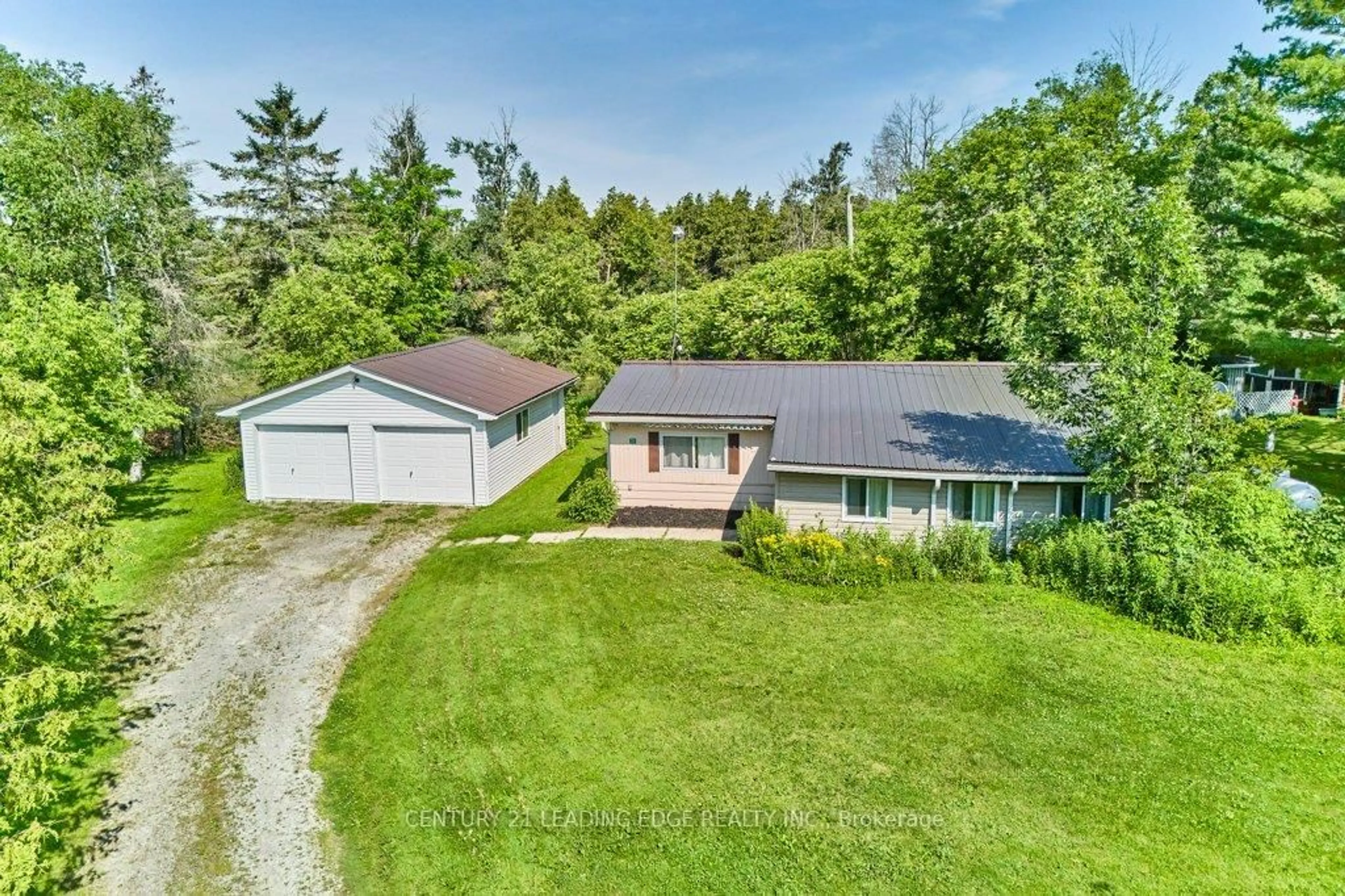 A pic from outside/outdoor area/front of a property/back of a property/a pic from drone, unknown for 21 Otter Line, Kawartha Lakes Ontario K9V 4R4