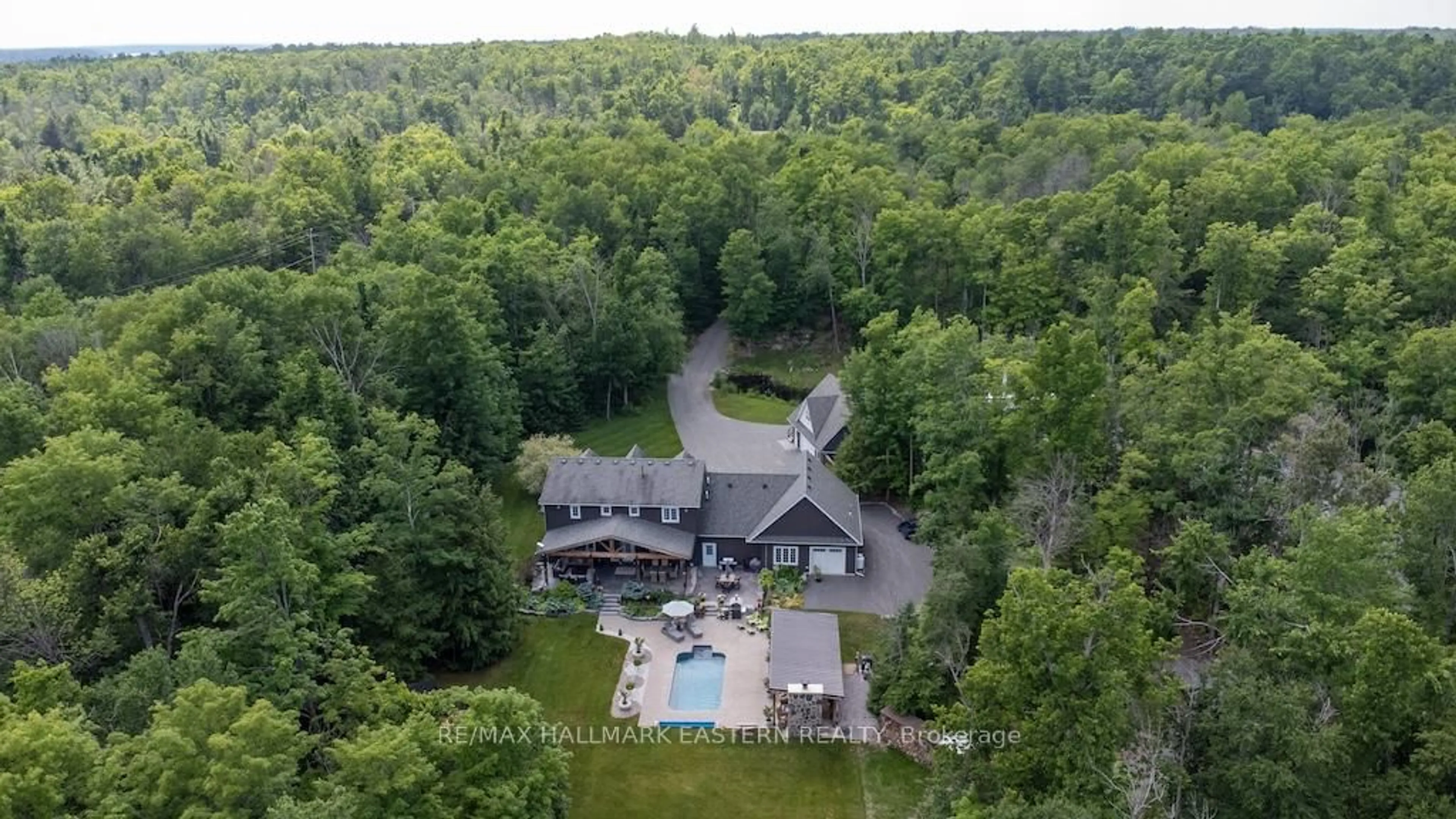 A pic from outside/outdoor area/front of a property/back of a property/a pic from drone, water/lake/river/ocean view for 267 Edwina Dr, Trent Lakes Ontario K0M 1A0
