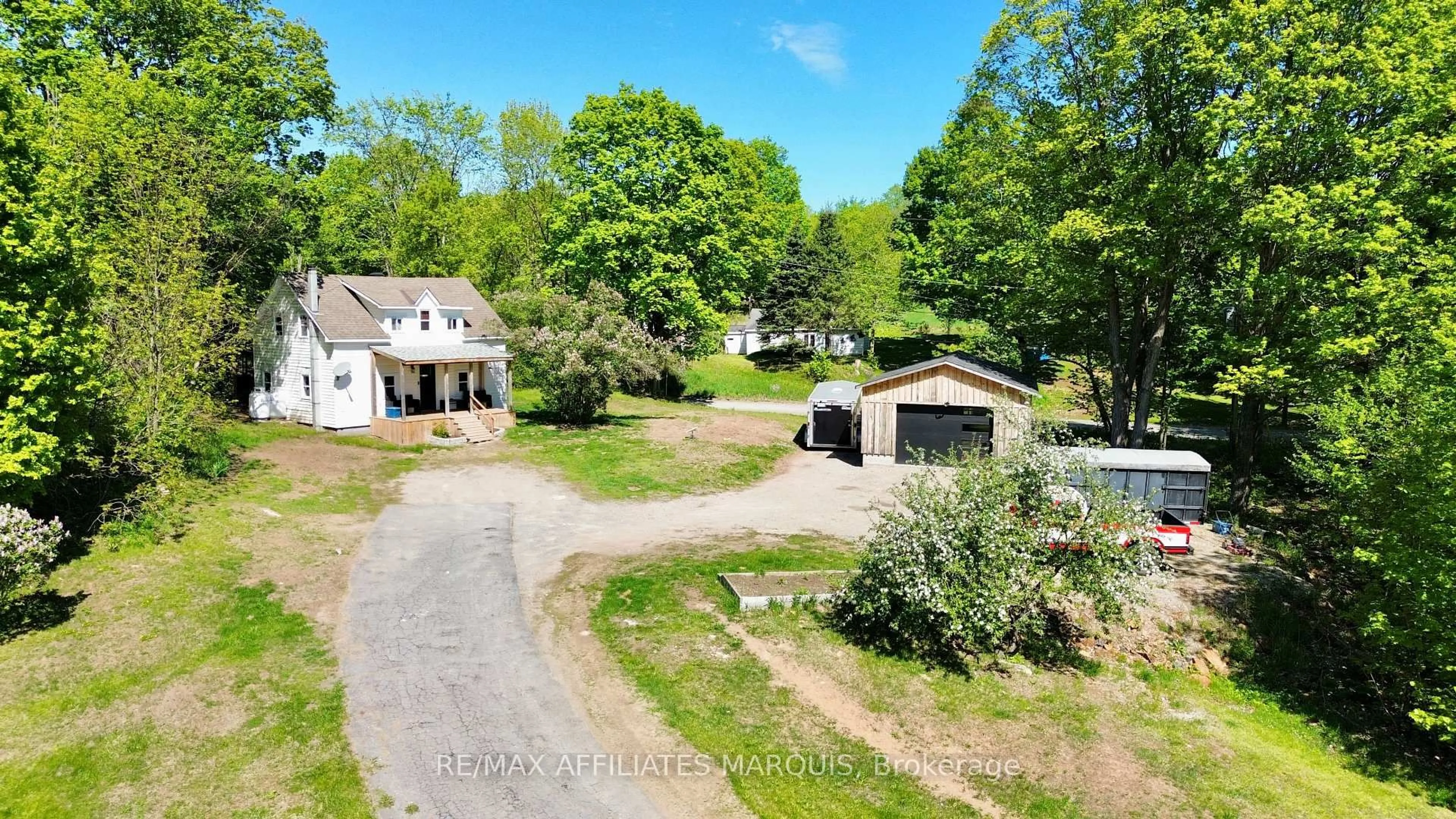 A pic from outside/outdoor area/front of a property/back of a property/a pic from drone, unknown for 14702 38 Rd, Sharbot Lake Ontario K0H 2P0
