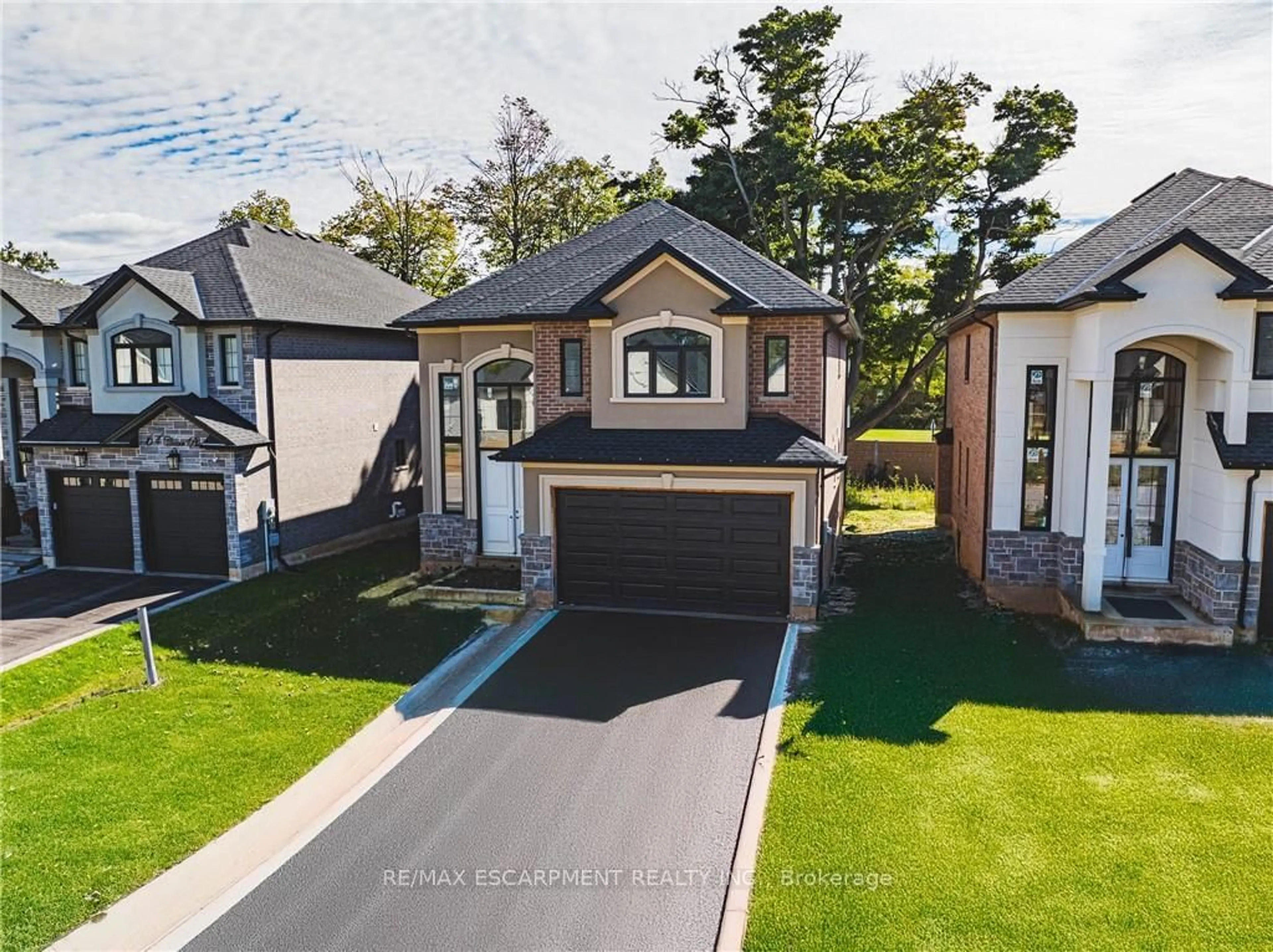 A pic from outside/outdoor area/front of a property/back of a property/a pic from drone, street for 52 Cesar Pl, Hamilton Ontario L9G 0G3