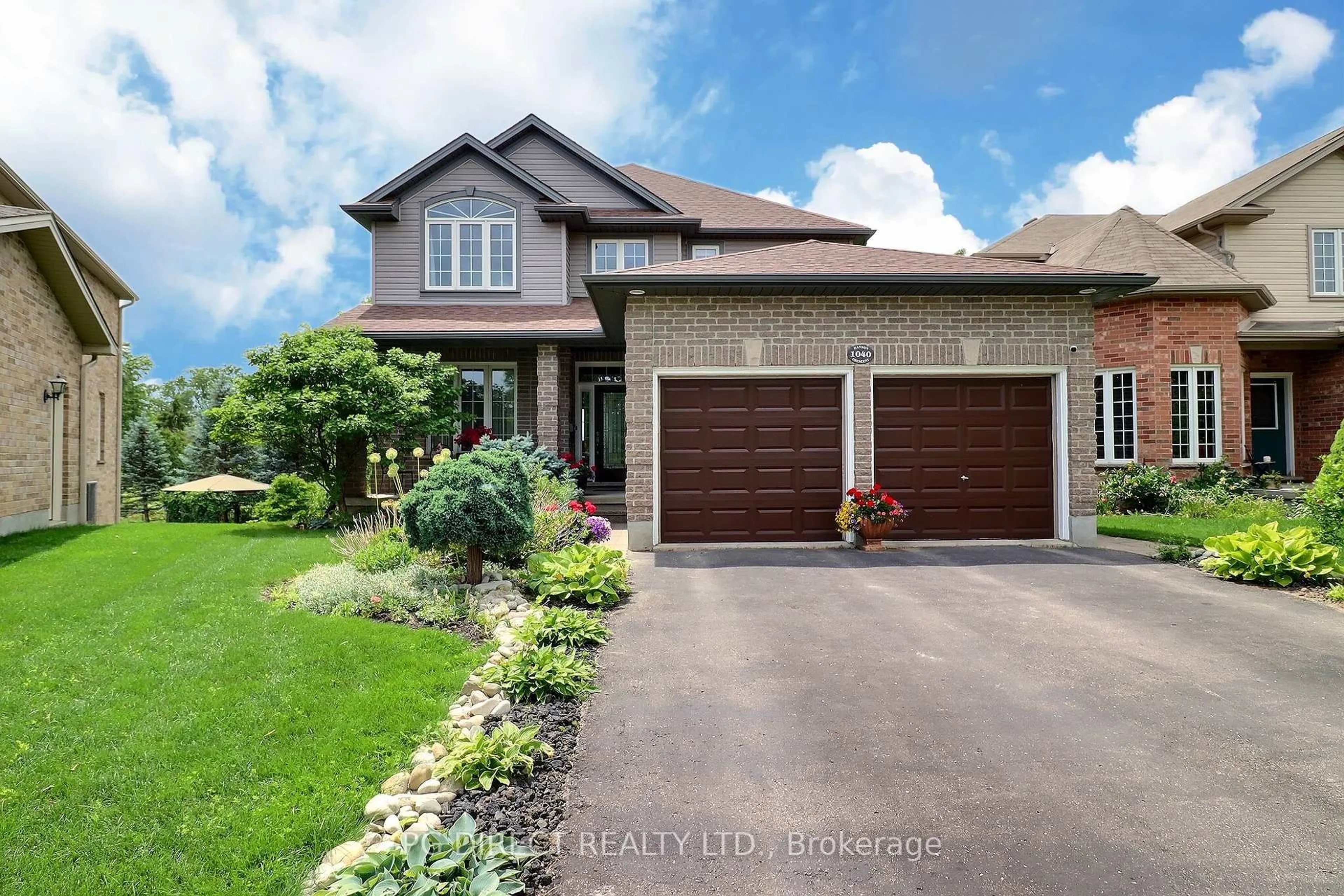 Home with brick exterior material, street for 1040 Hanson Cres, London North Ontario N6G 0B9