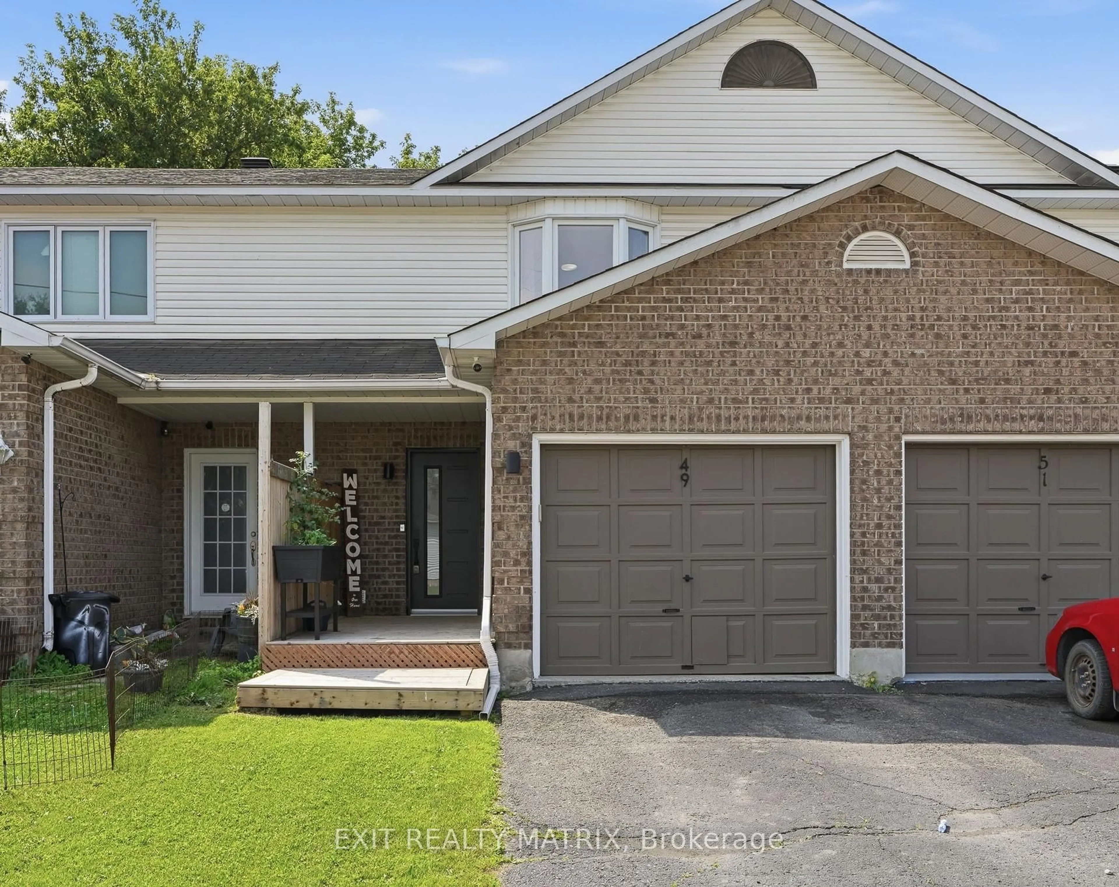 Home with brick exterior material, street for 49 Forget St, Russell Ontario K0A 1W0