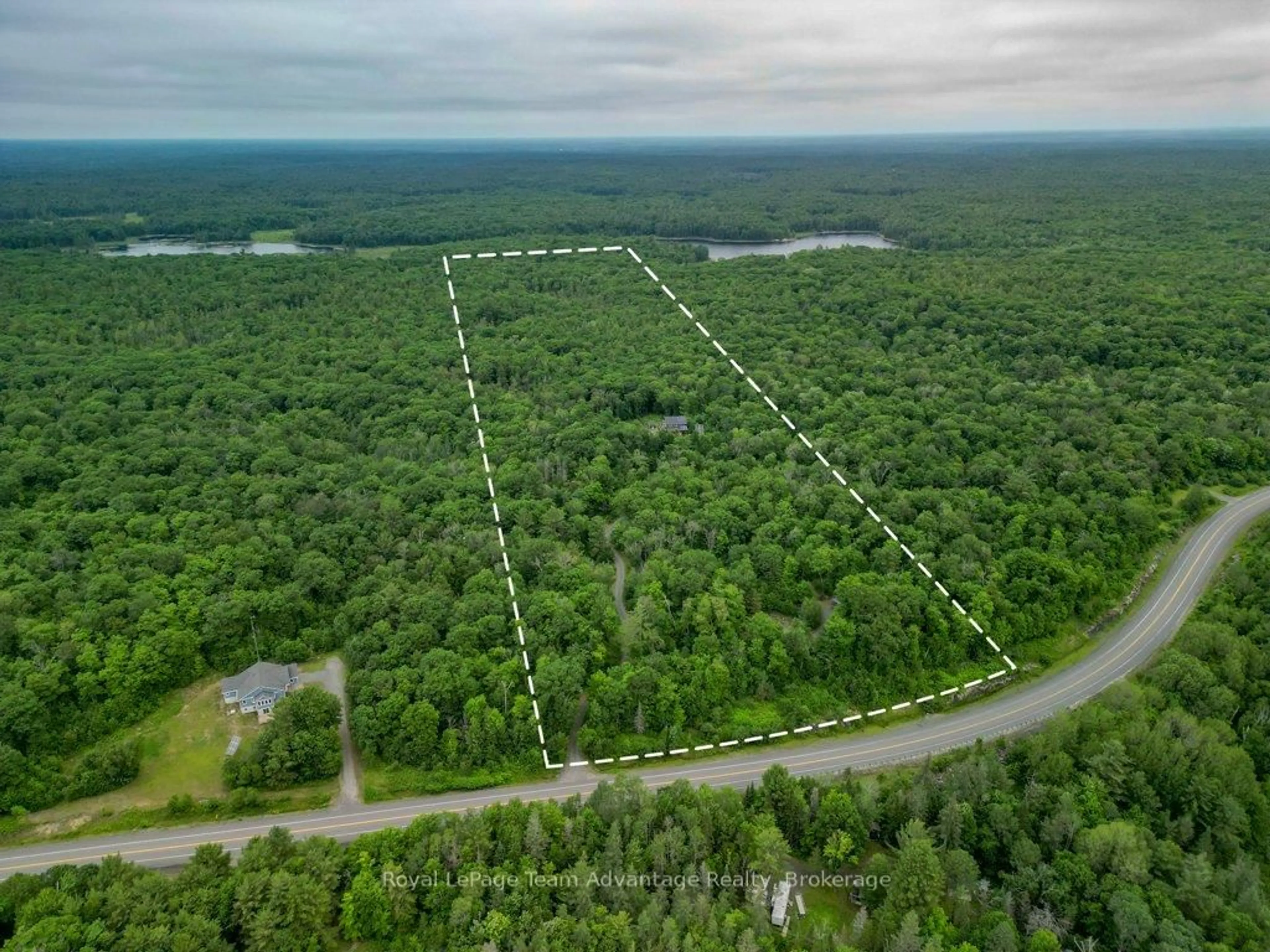 A pic from outside/outdoor area/front of a property/back of a property/a pic from drone, forest/trees view for 558 518 Highway, Seguin Ontario P2A 0B2