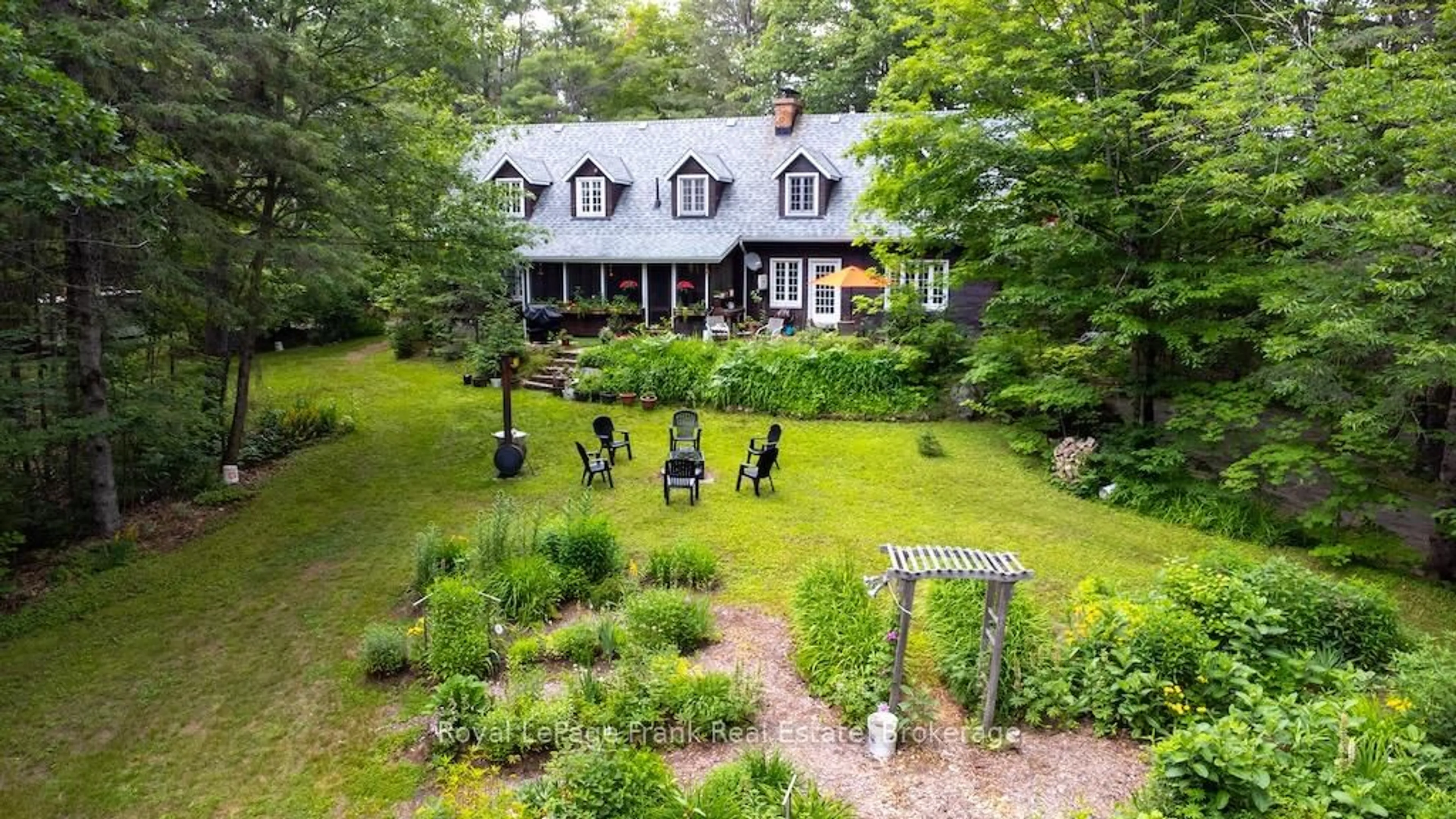 A pic from outside/outdoor area/front of a property/back of a property/a pic from drone, unknown for 3719 County Rd 507 Rd, Trent Lakes Ontario K0L 1J0