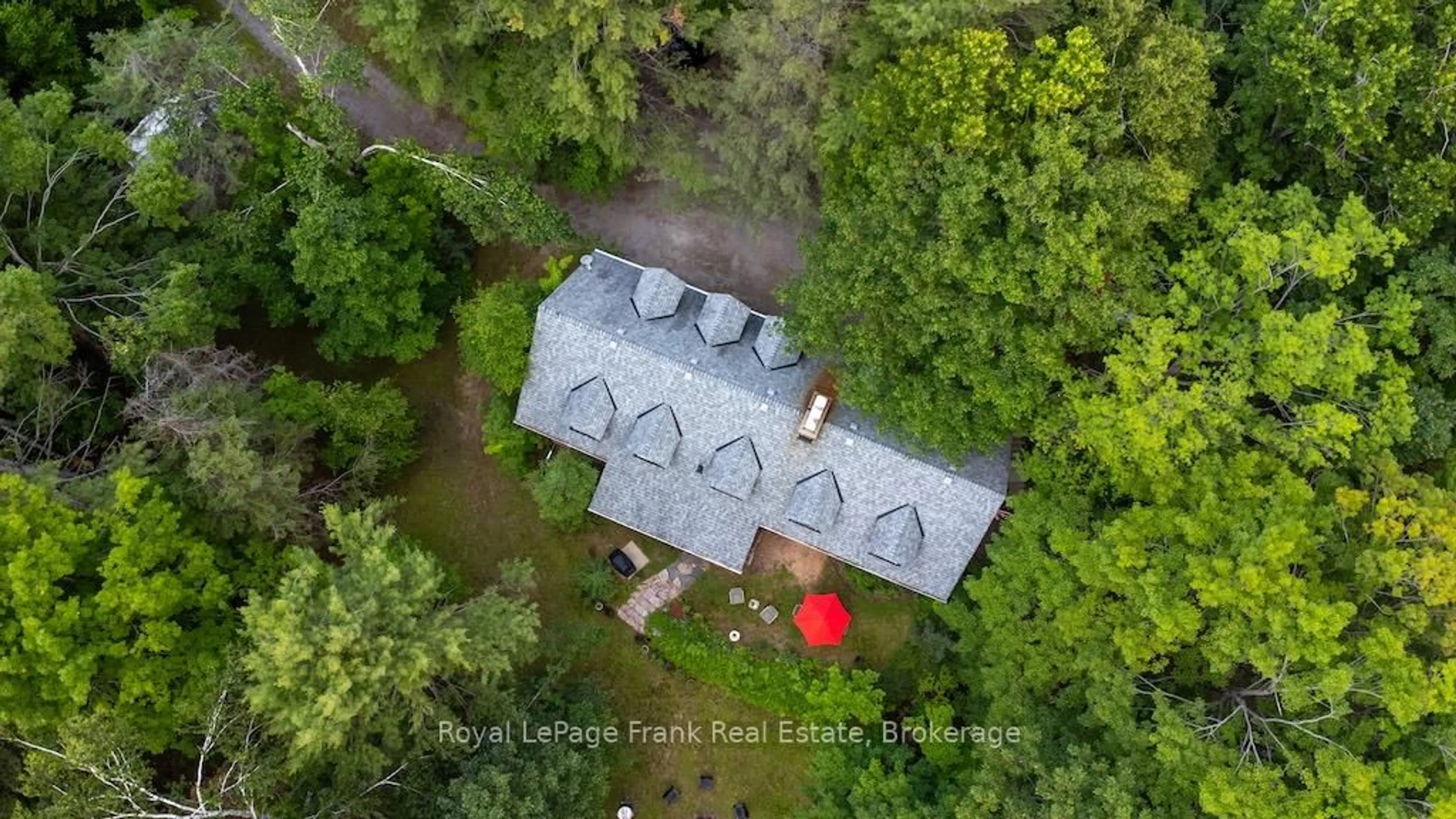 A pic from outside/outdoor area/front of a property/back of a property/a pic from drone, unknown for 3719 County Rd 507 Rd, Trent Lakes Ontario K0L 1J0