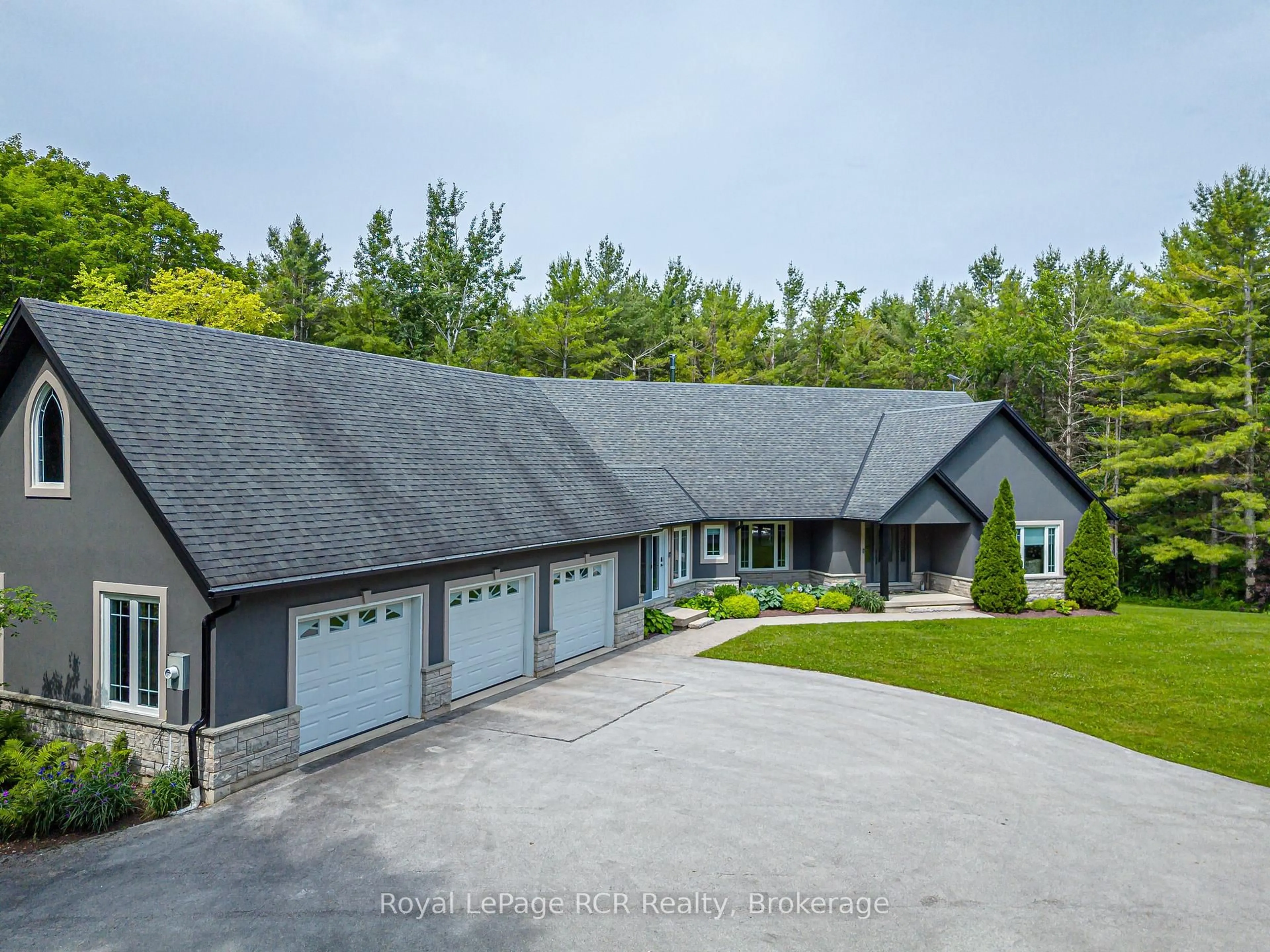 A pic from outside/outdoor area/front of a property/back of a property/a pic from drone, street for 595530 4TH Line, Blue Mountains Ontario N0H 2H0