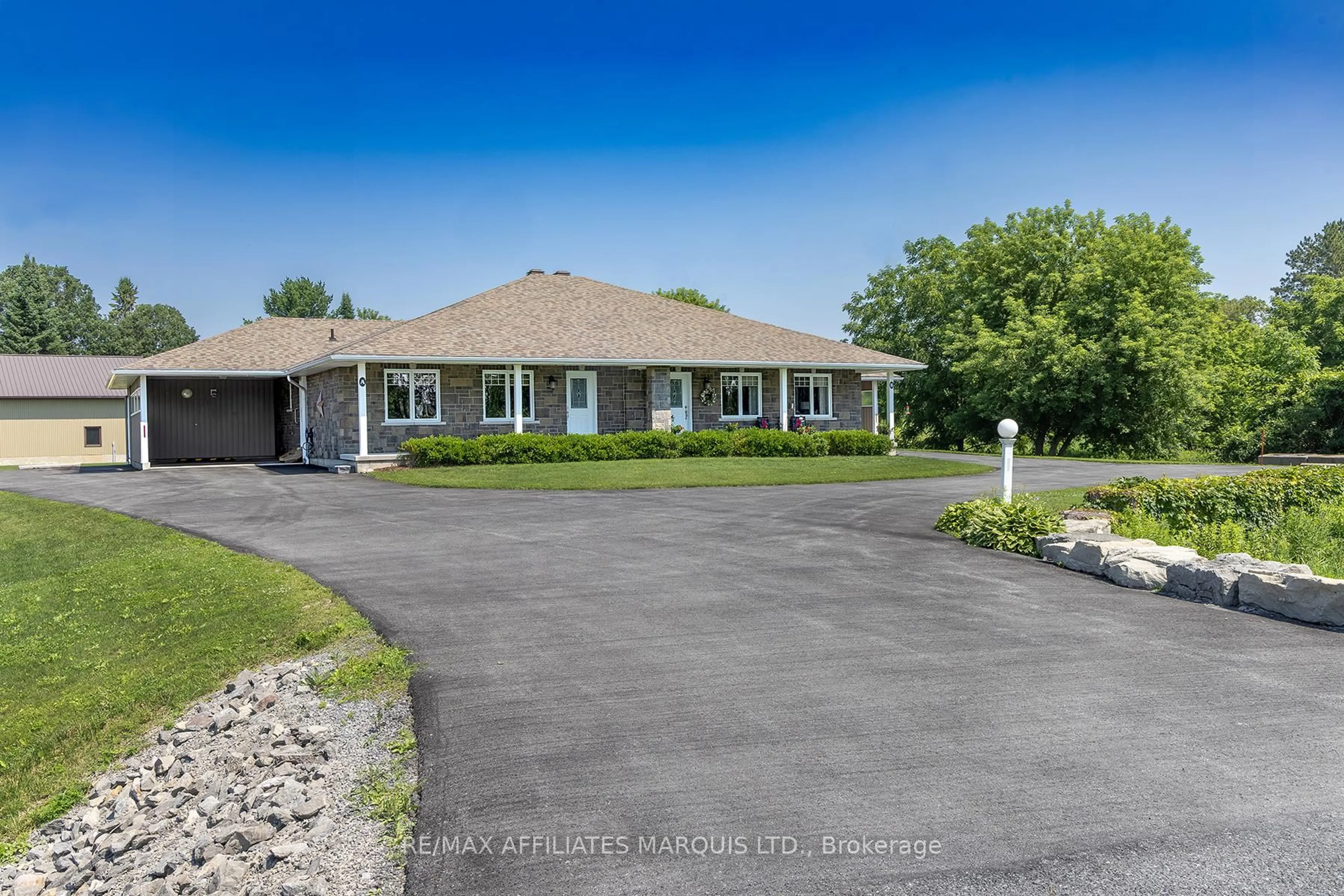 A pic from outside/outdoor area/front of a property/back of a property/a pic from drone, street for 12057 LAKESHORE Dr, South Dundas Ontario K0C 1X0