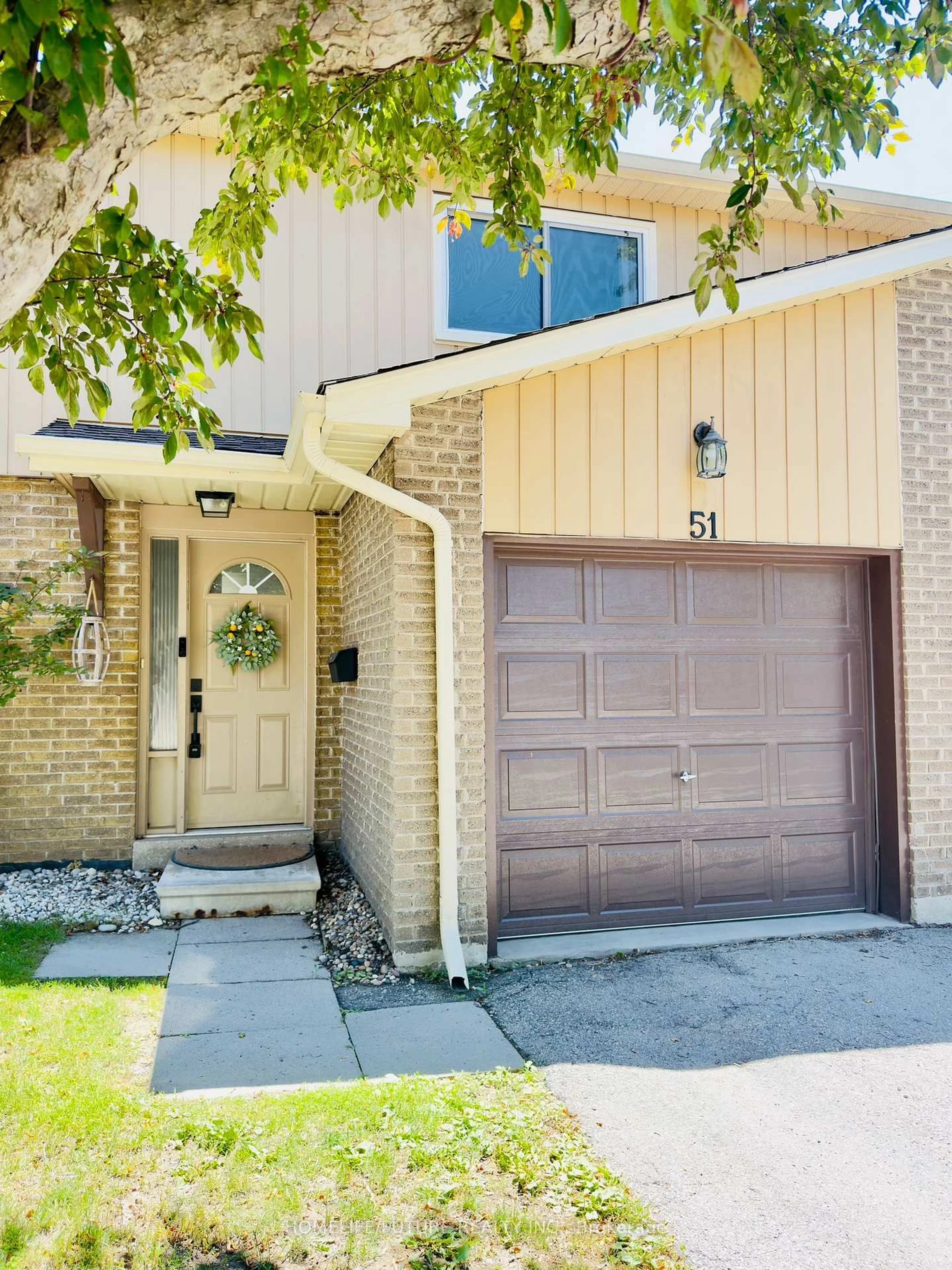 Home with brick exterior material, street for 51 Paulander Dr #51, Kitchener Ontario N2M 5E5