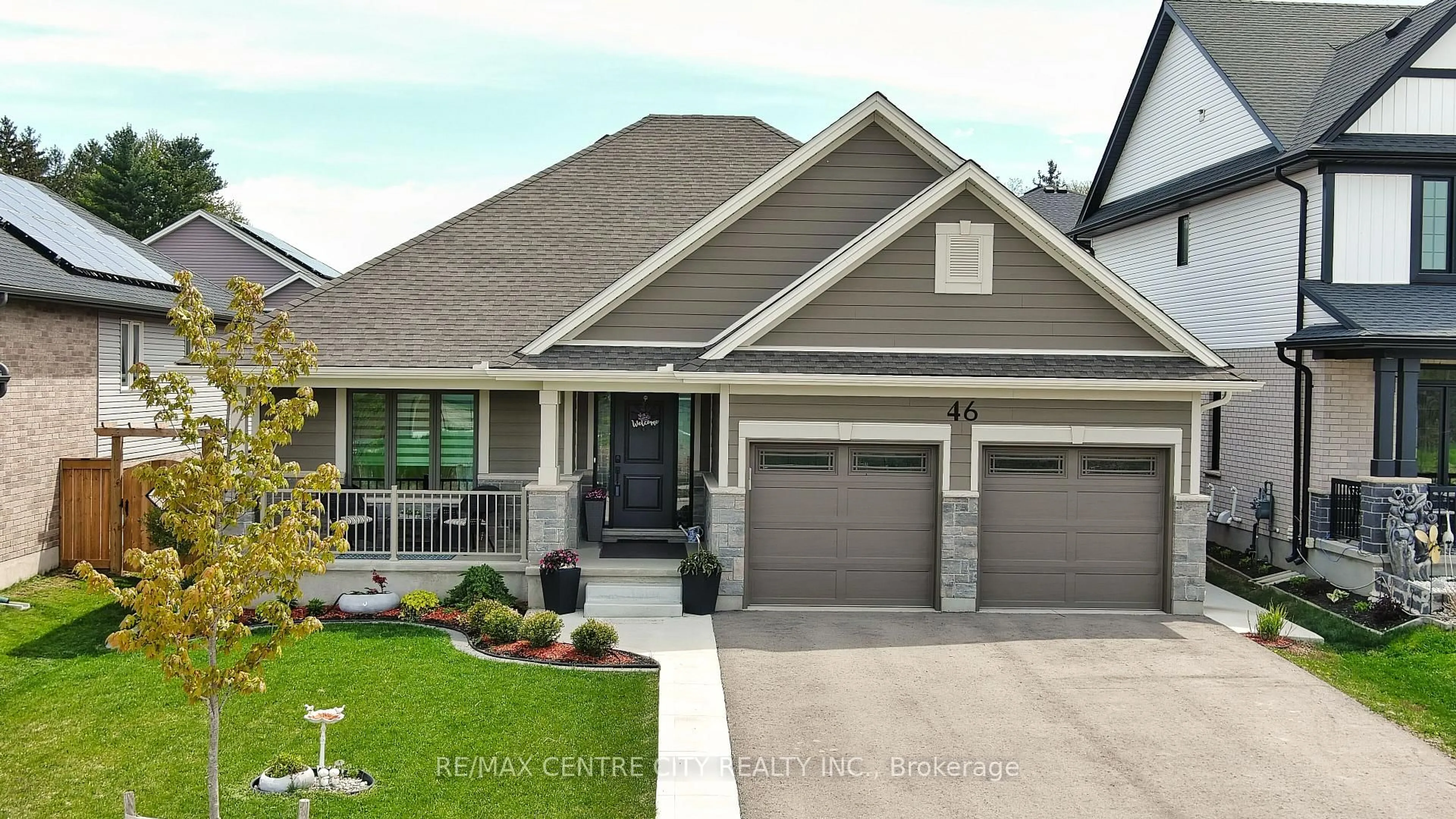 Home with vinyl exterior material, street for 46 Snowy Owl Tr, Central Elgin Ontario N5R 0M6