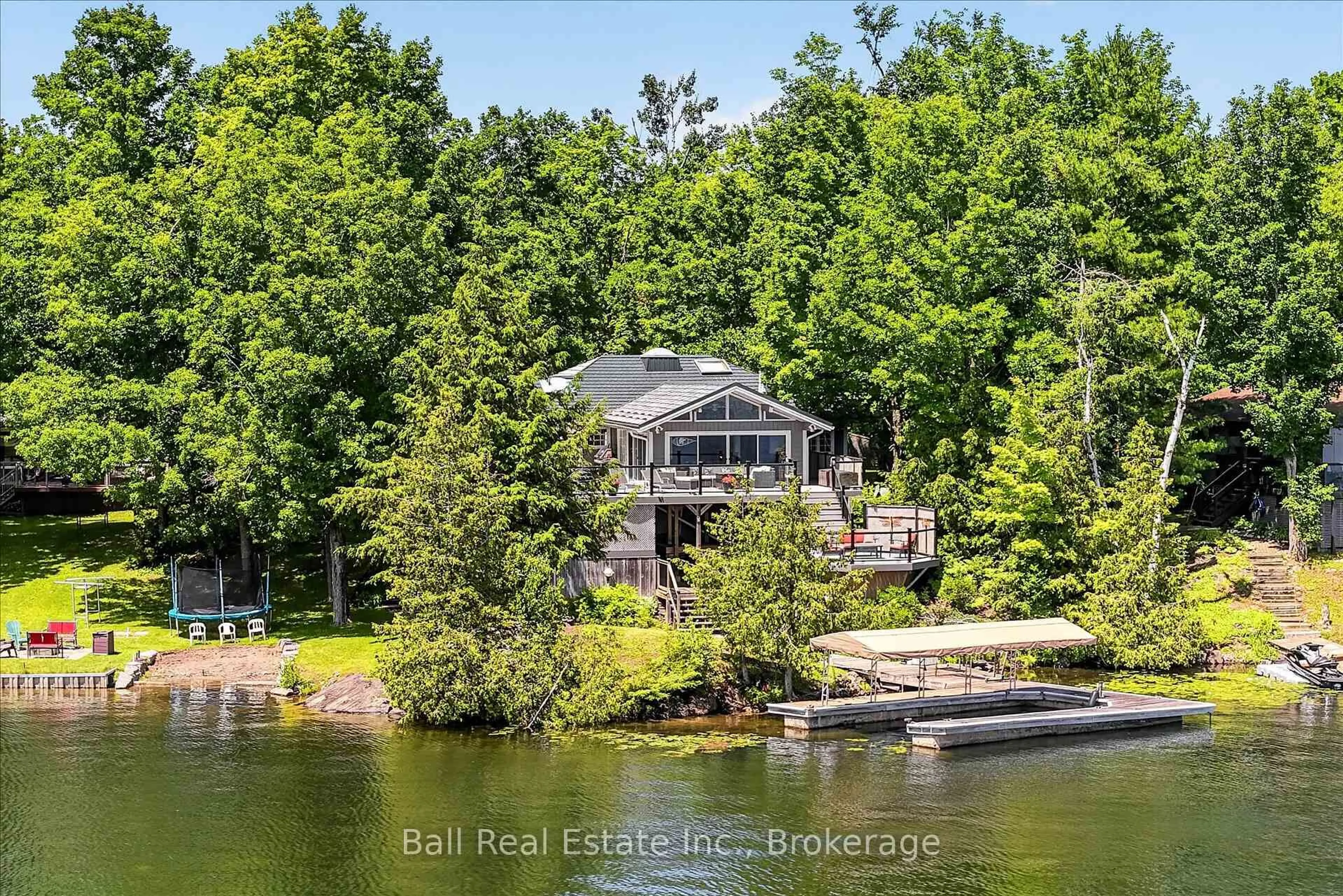 A pic from outside/outdoor area/front of a property/back of a property/a pic from drone, water/lake/river/ocean view for 150 Hall Dr, Trent Lakes Ontario K0L 1J0