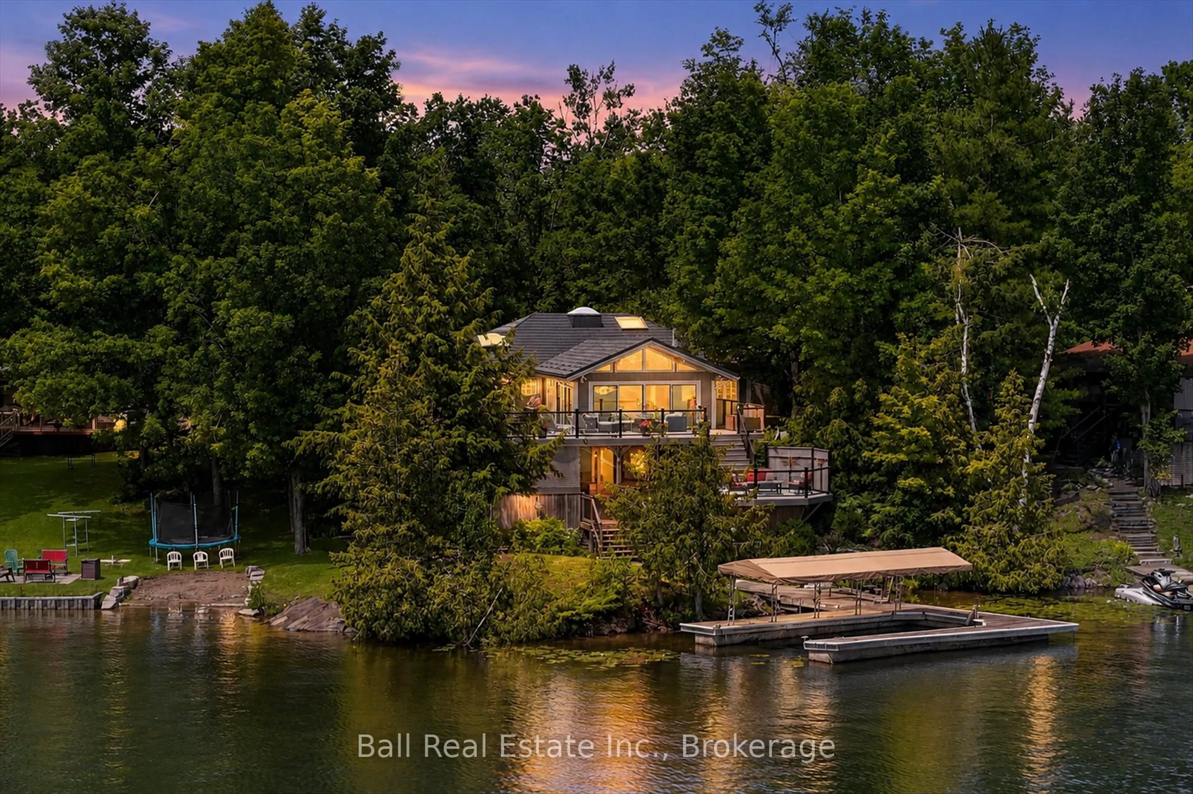 A pic from outside/outdoor area/front of a property/back of a property/a pic from drone, water/lake/river/ocean view for 150 Hall Dr, Trent Lakes Ontario K0L 1J0