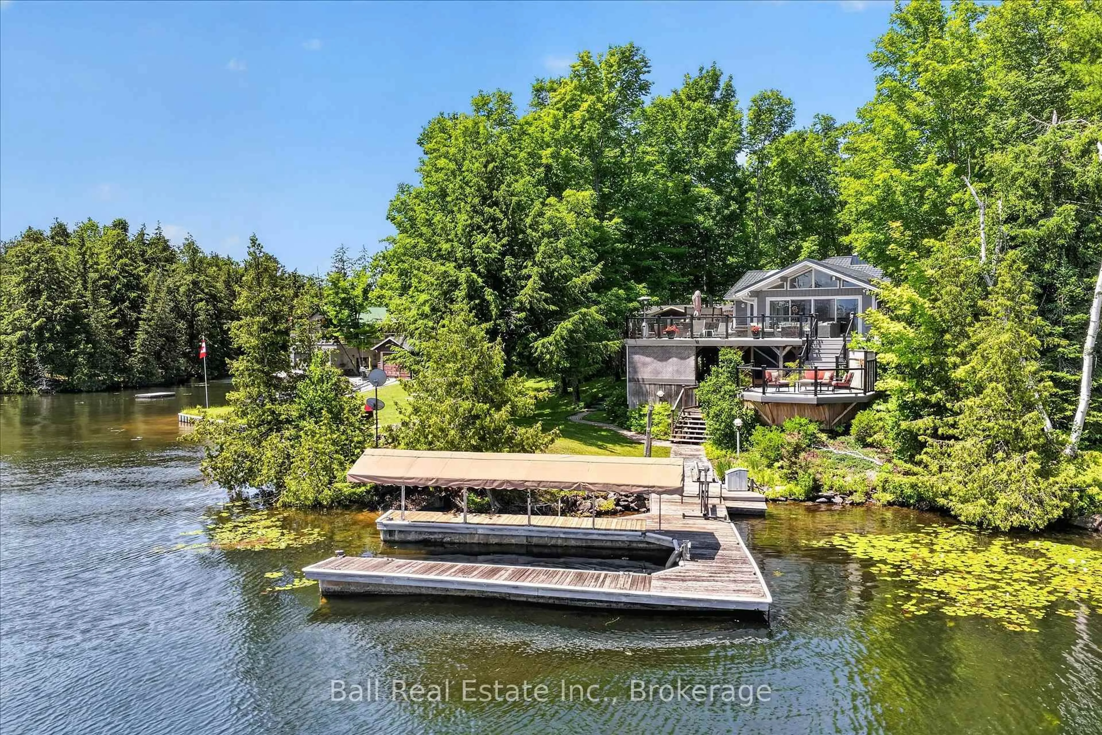A pic from outside/outdoor area/front of a property/back of a property/a pic from drone, water/lake/river/ocean view for 150 Hall Dr, Trent Lakes Ontario K0L 1J0