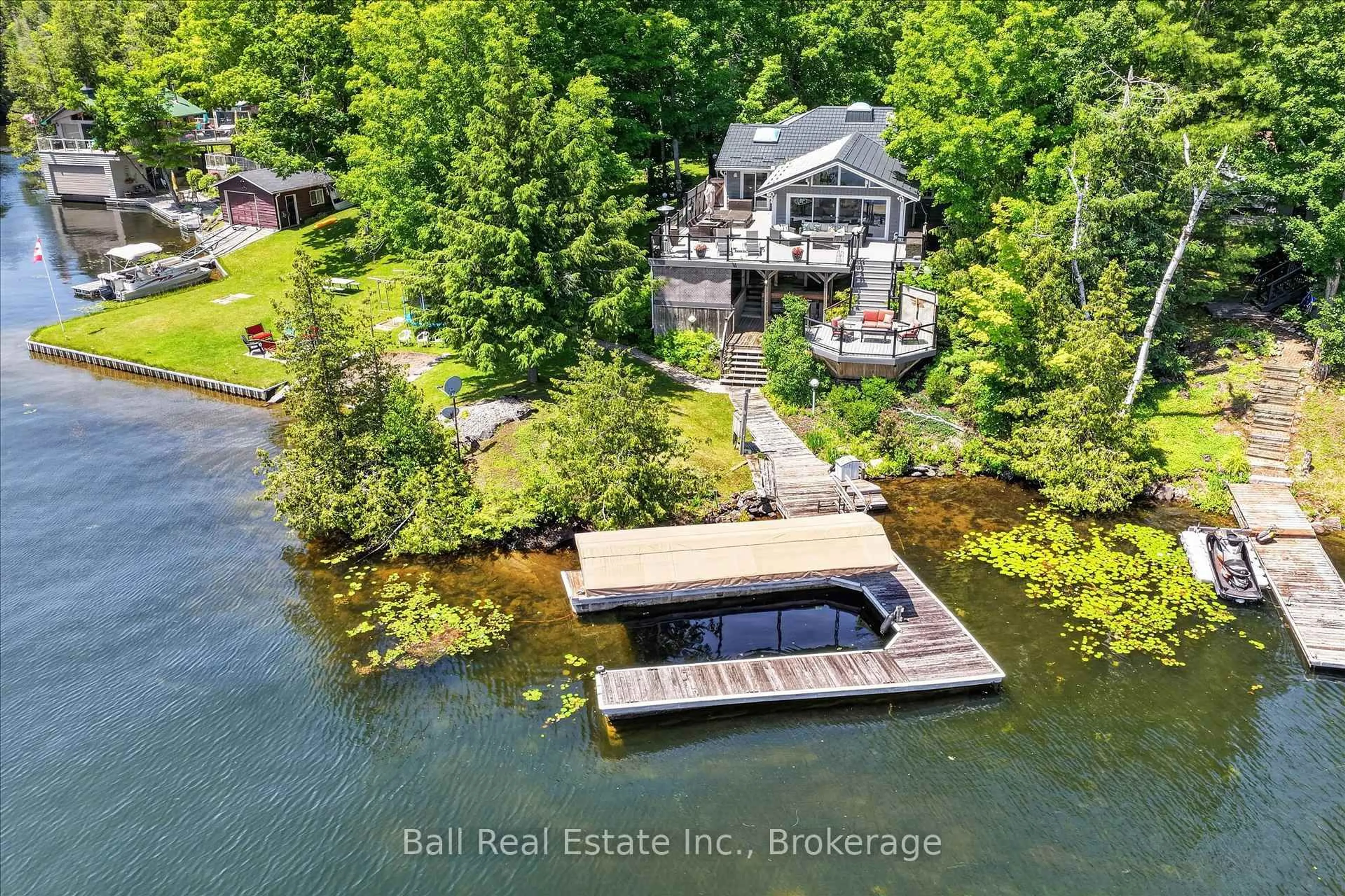 A pic from outside/outdoor area/front of a property/back of a property/a pic from drone, water/lake/river/ocean view for 150 Hall Dr, Trent Lakes Ontario K0L 1J0