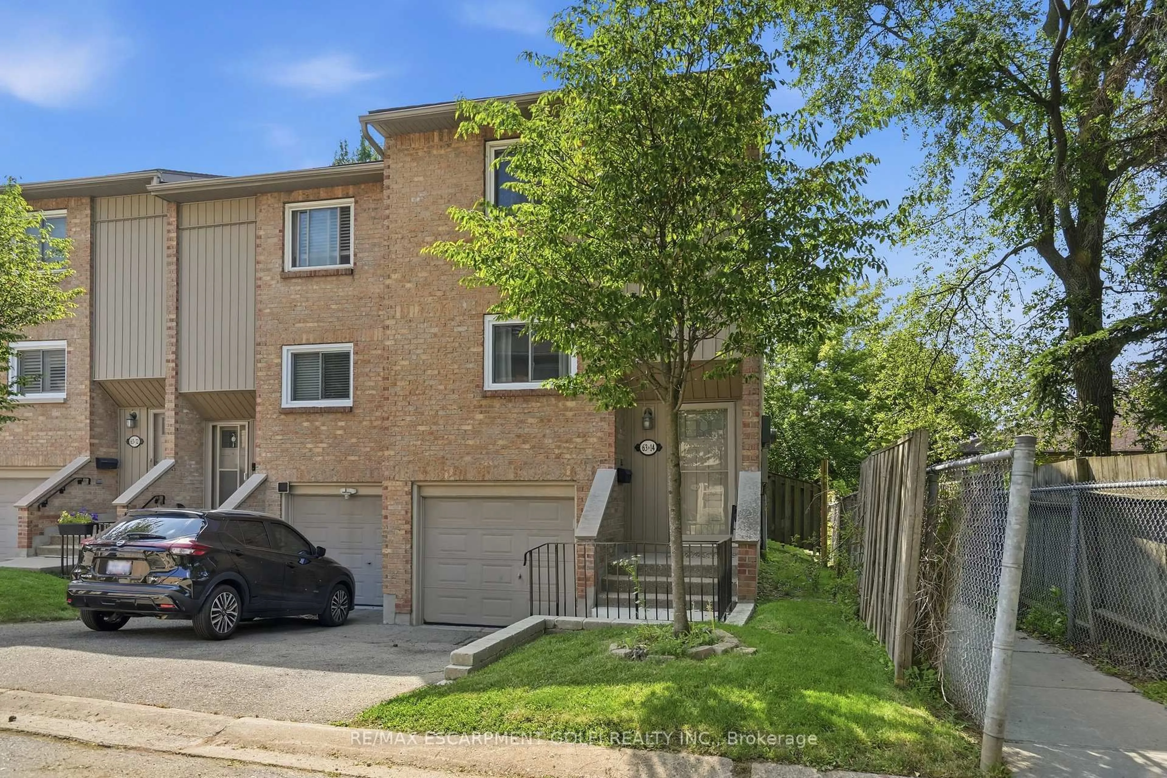 A pic from outside/outdoor area/front of a property/back of a property/a pic from drone, street for 63 Fonthill Rd #14, Hamilton Ontario L9C 6T1