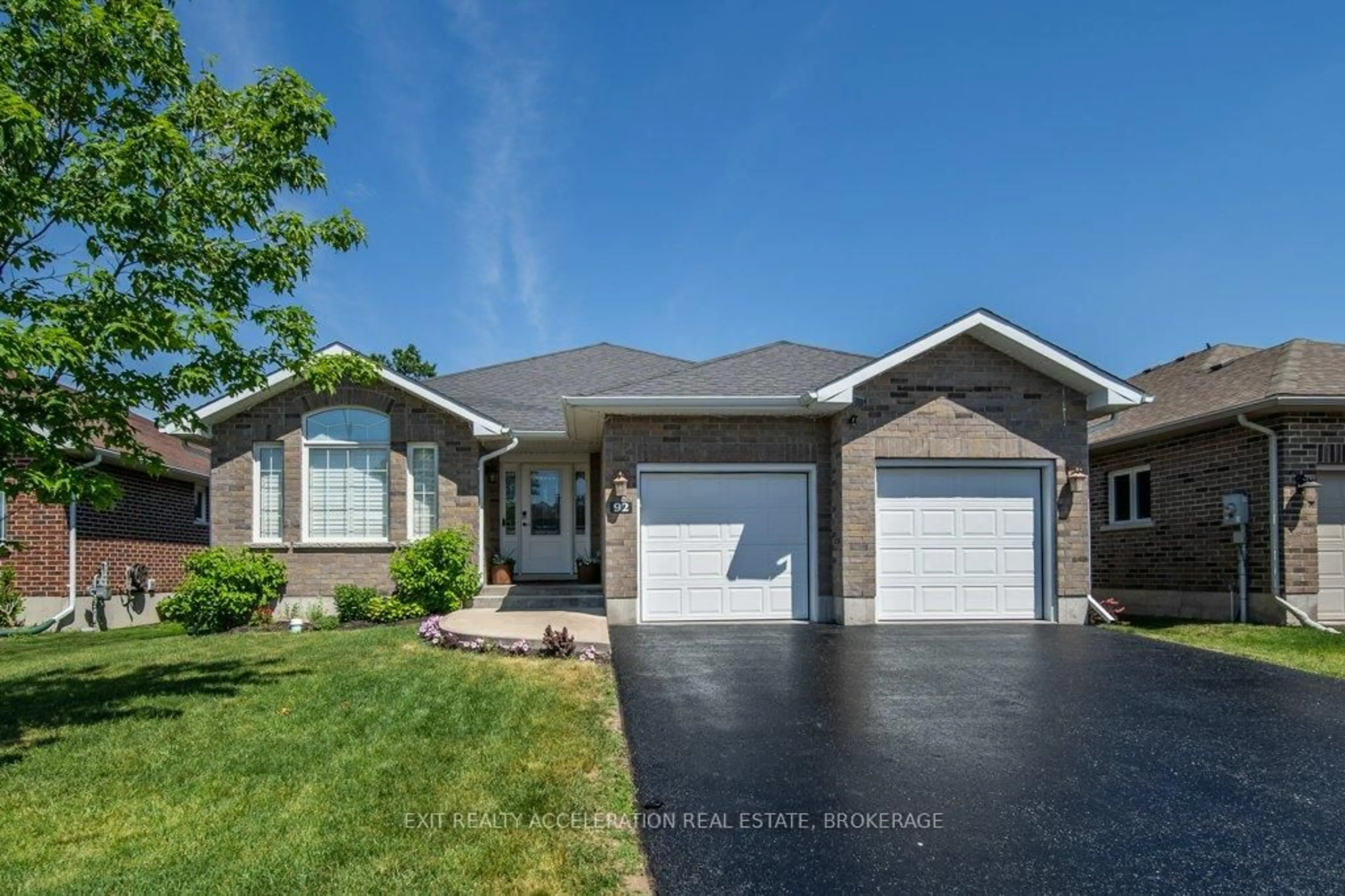 Home with brick exterior material, street for 92 Hartwood Cres, Greater Napanee Ontario K7R 0A8
