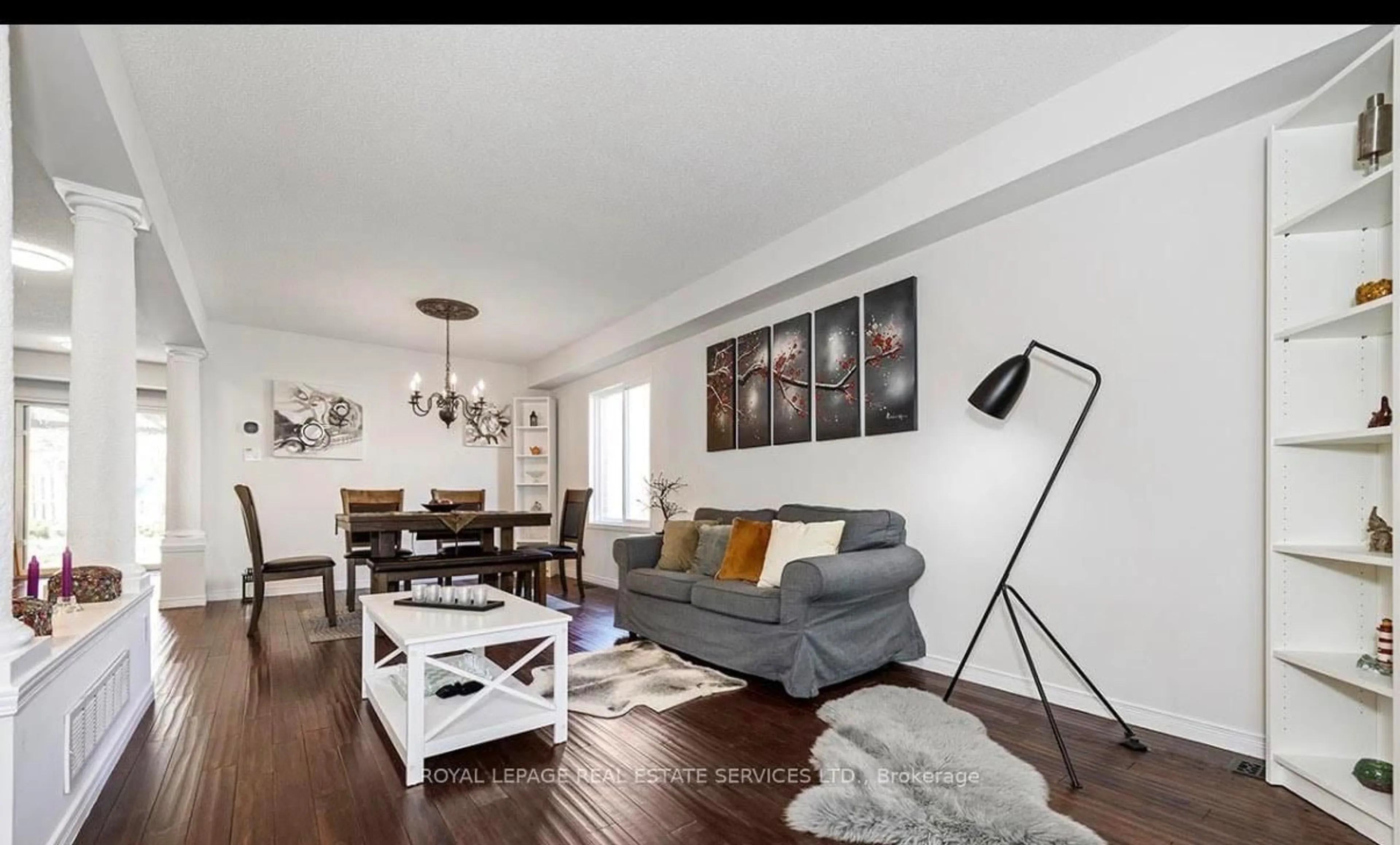 Living room with furniture, wood/laminate floor for 635 Commonwealth Cres, Kitchener Ontario N2E 4J9