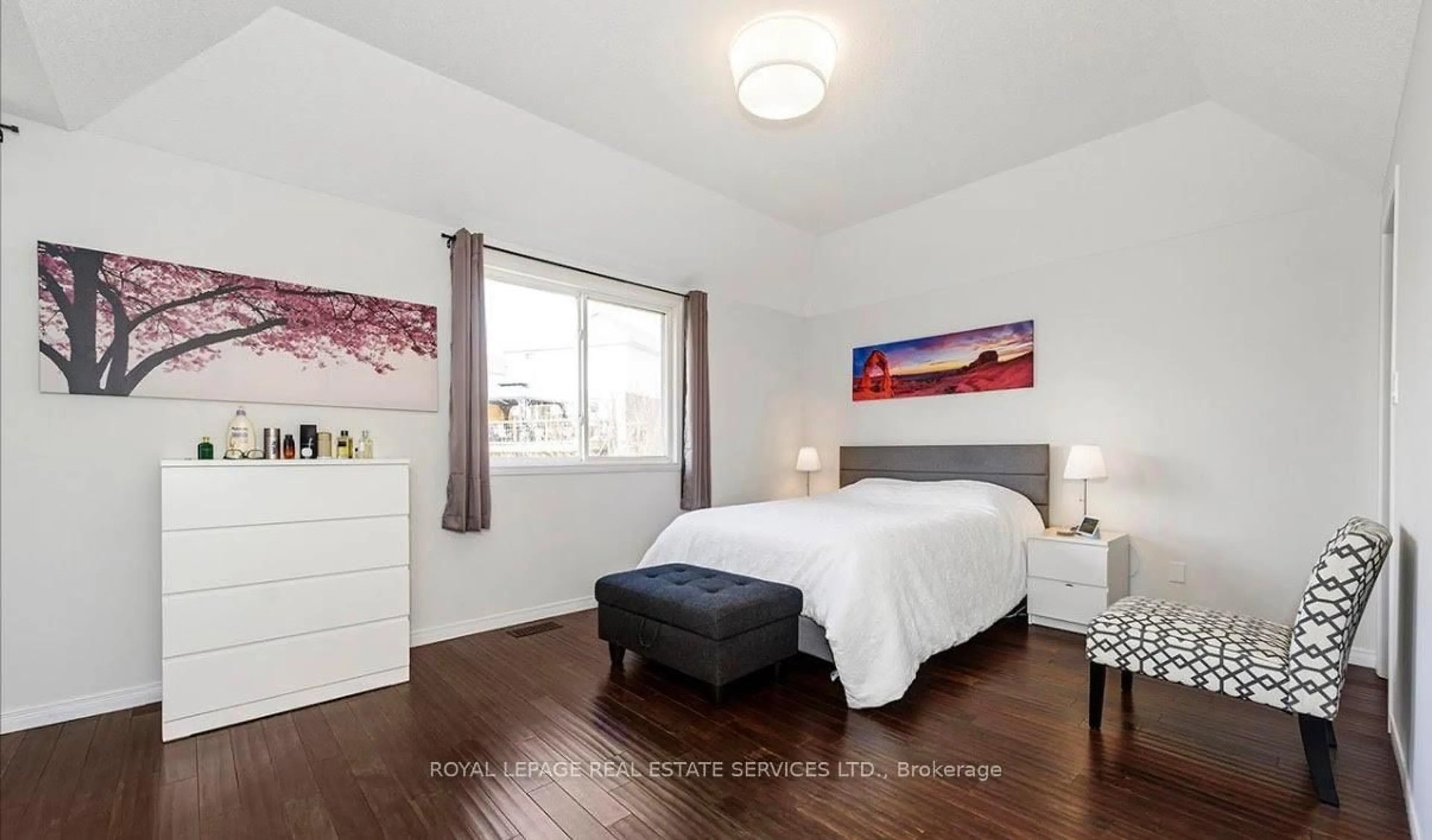 Bedroom with bed, wood/laminate floor for 635 Commonwealth Cres, Kitchener Ontario N2E 4J9