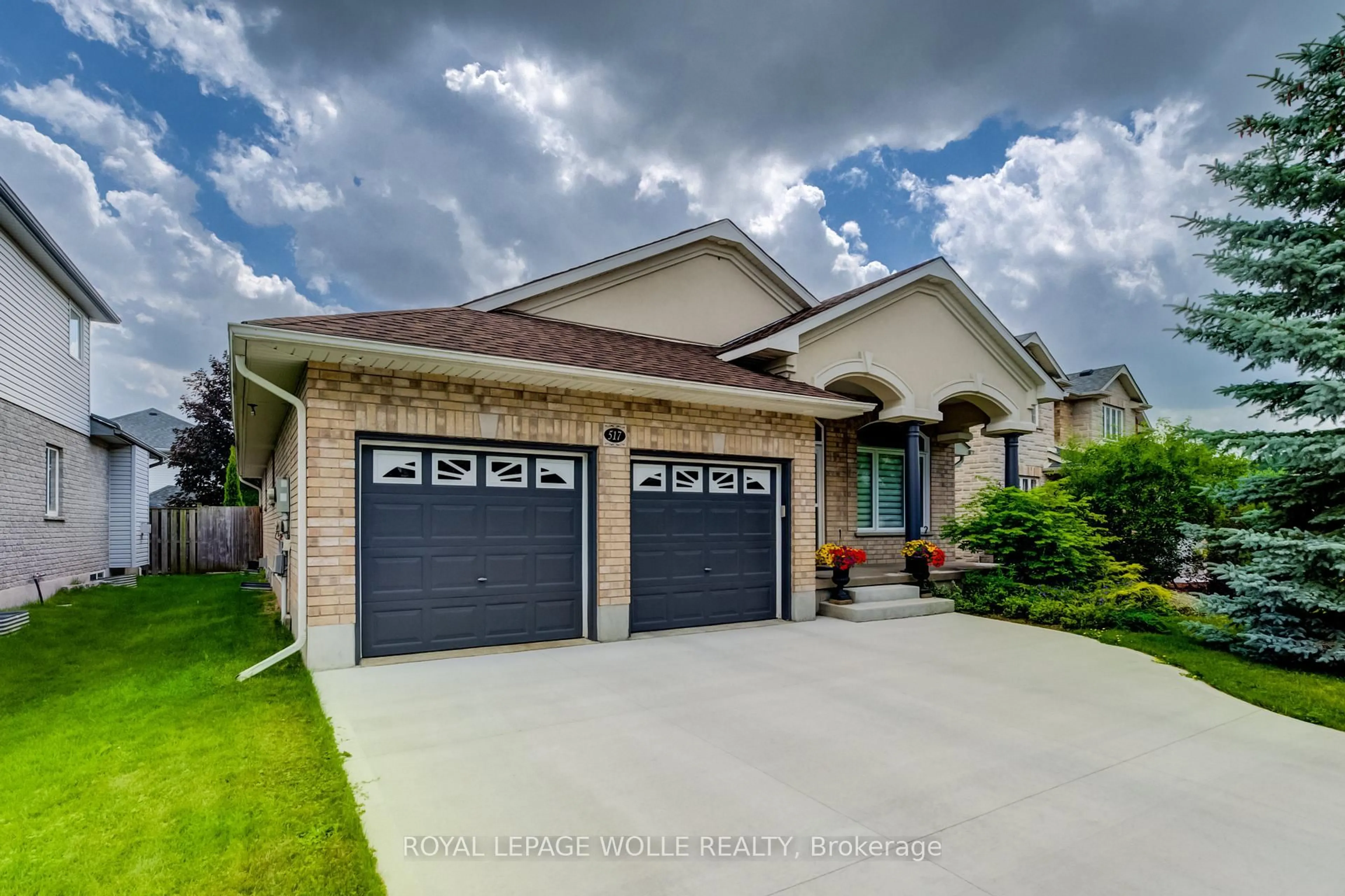 Home with brick exterior material, street for 517 Starboard Cres, Waterloo Ontario N2K 4G5