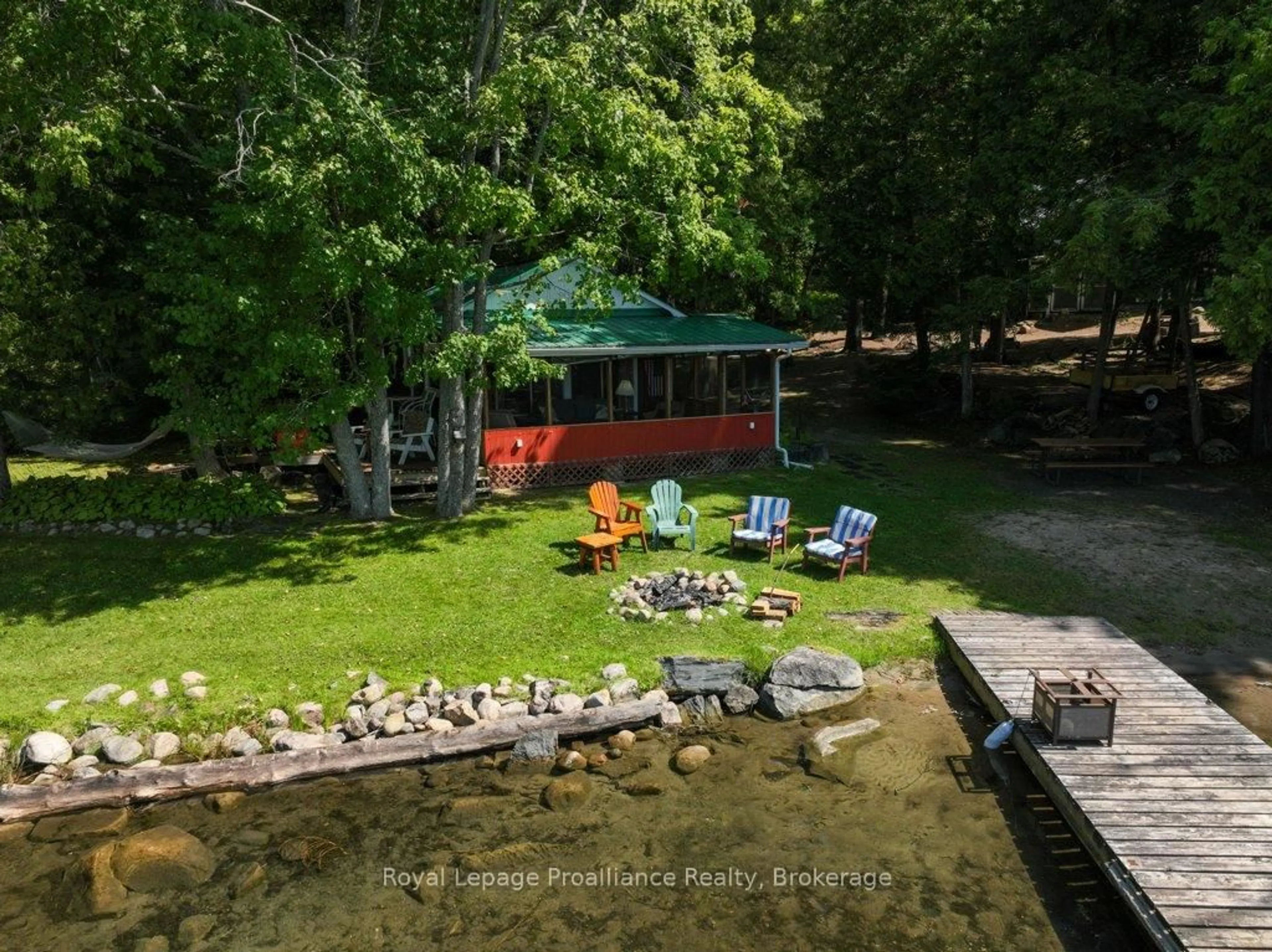A pic from outside/outdoor area/front of a property/back of a property/a pic from drone, water/lake/river/ocean view for 1117B Twin Pine Lane, Plevna Ontario K0H 2M0
