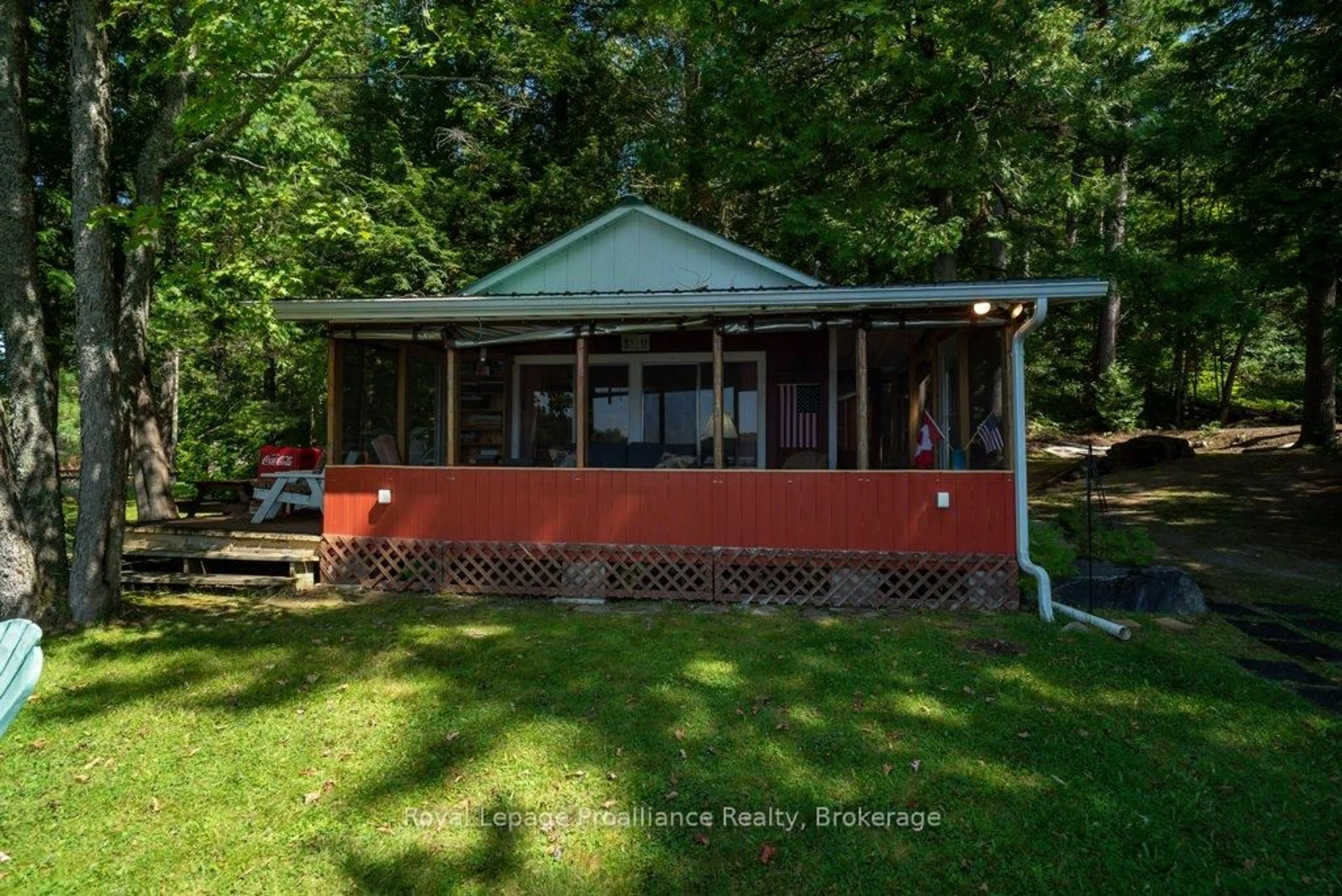 A pic from outside/outdoor area/front of a property/back of a property/a pic from drone, water/lake/river/ocean view for 1117B Twin Pine Lane, Plevna Ontario K0H 2M0