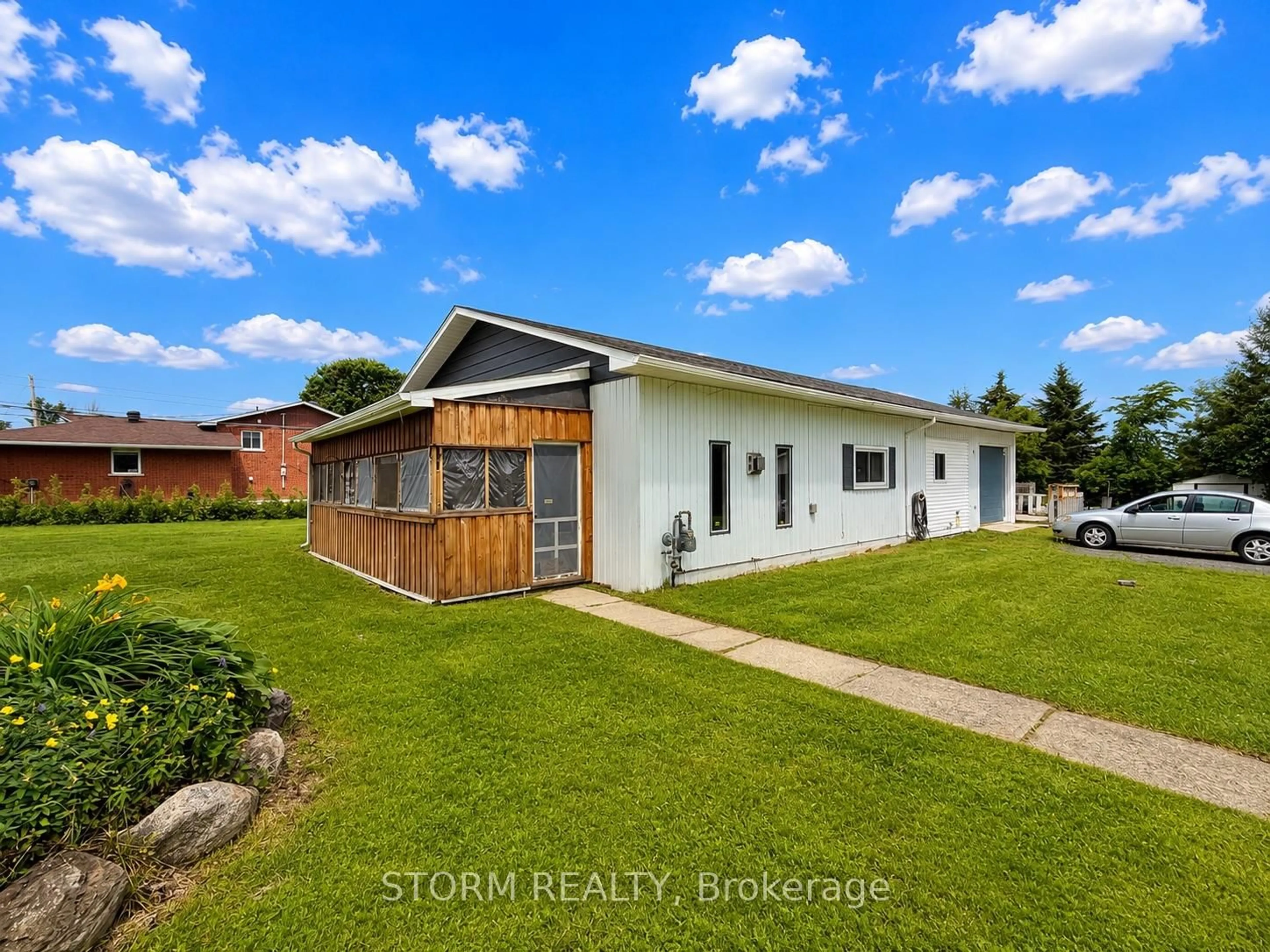 A pic from outside/outdoor area/front of a property/back of a property/a pic from drone, street for 5560 Avonmore Rd, South Stormont Ontario K0C 1P0