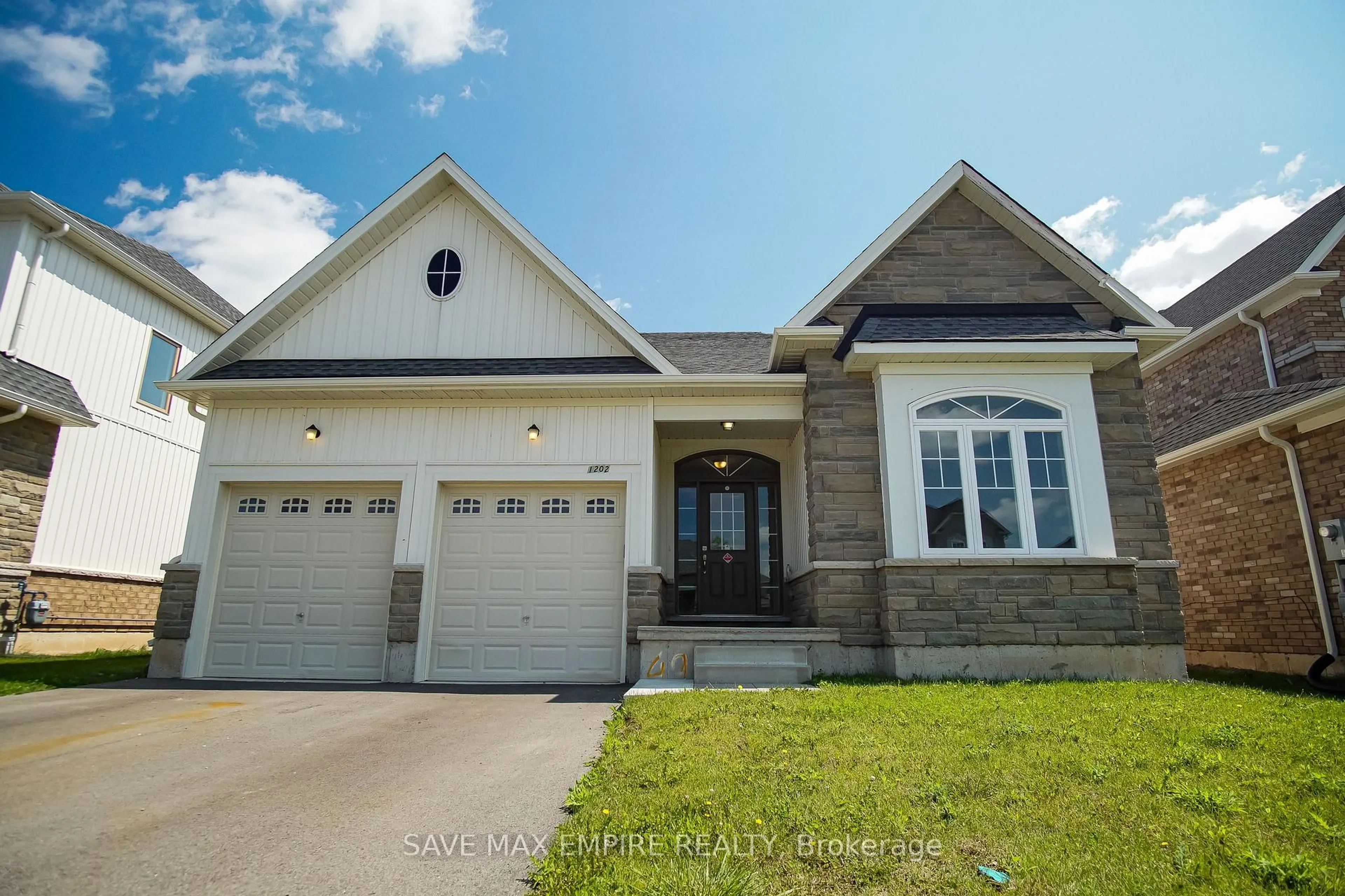 Home with brick exterior material, street for 1202 Green Acres Dr, Fort Erie Ontario L2A 0C9