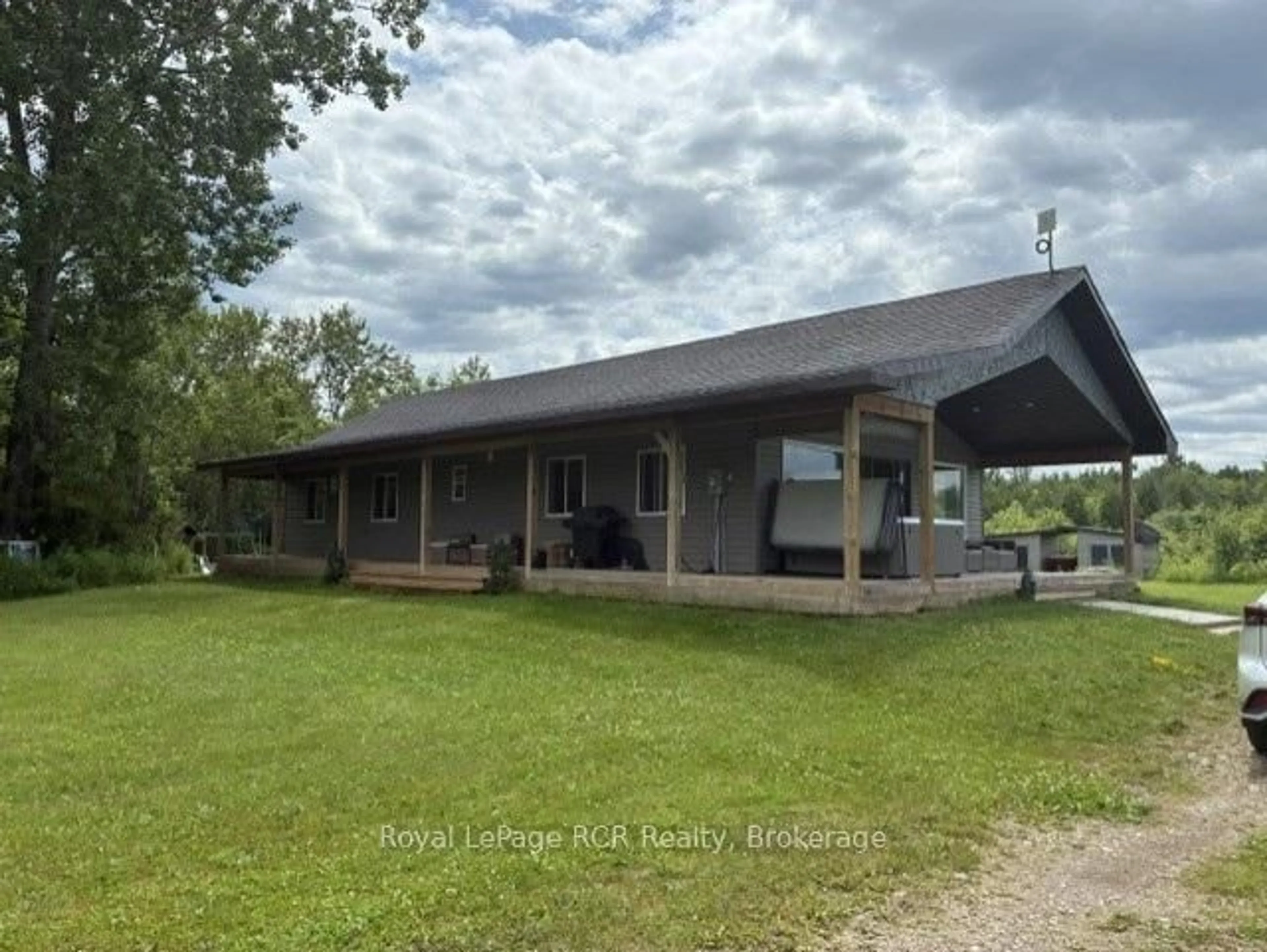 A pic from outside/outdoor area/front of a property/back of a property/a pic from drone, building for 382162 Concession 17 Rd, Georgian Bluffs Ontario N0H 2T0