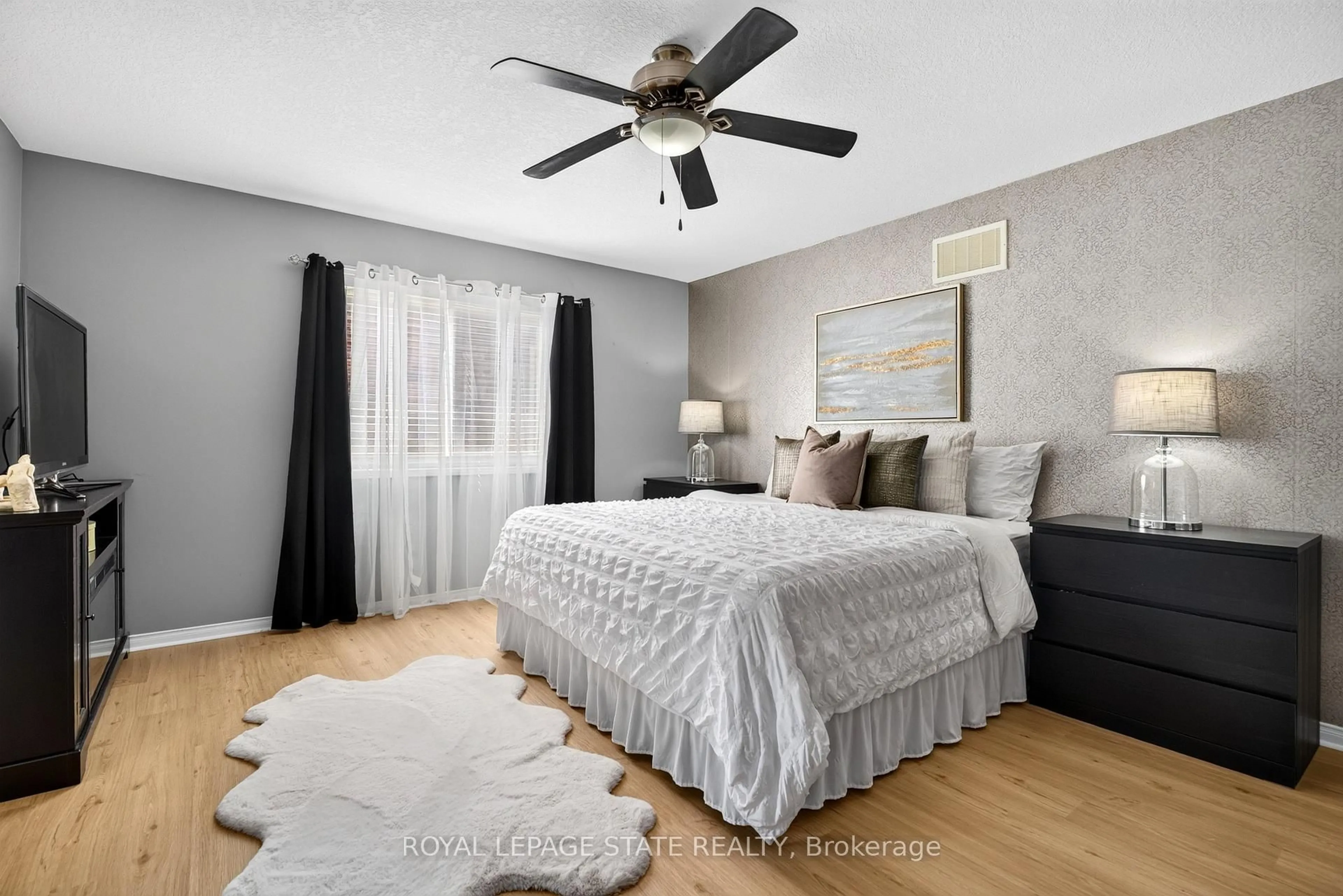 Bedroom with bed, wood/laminate floor for 140 Fowler Dr, Hamilton Ontario L0R 1C0