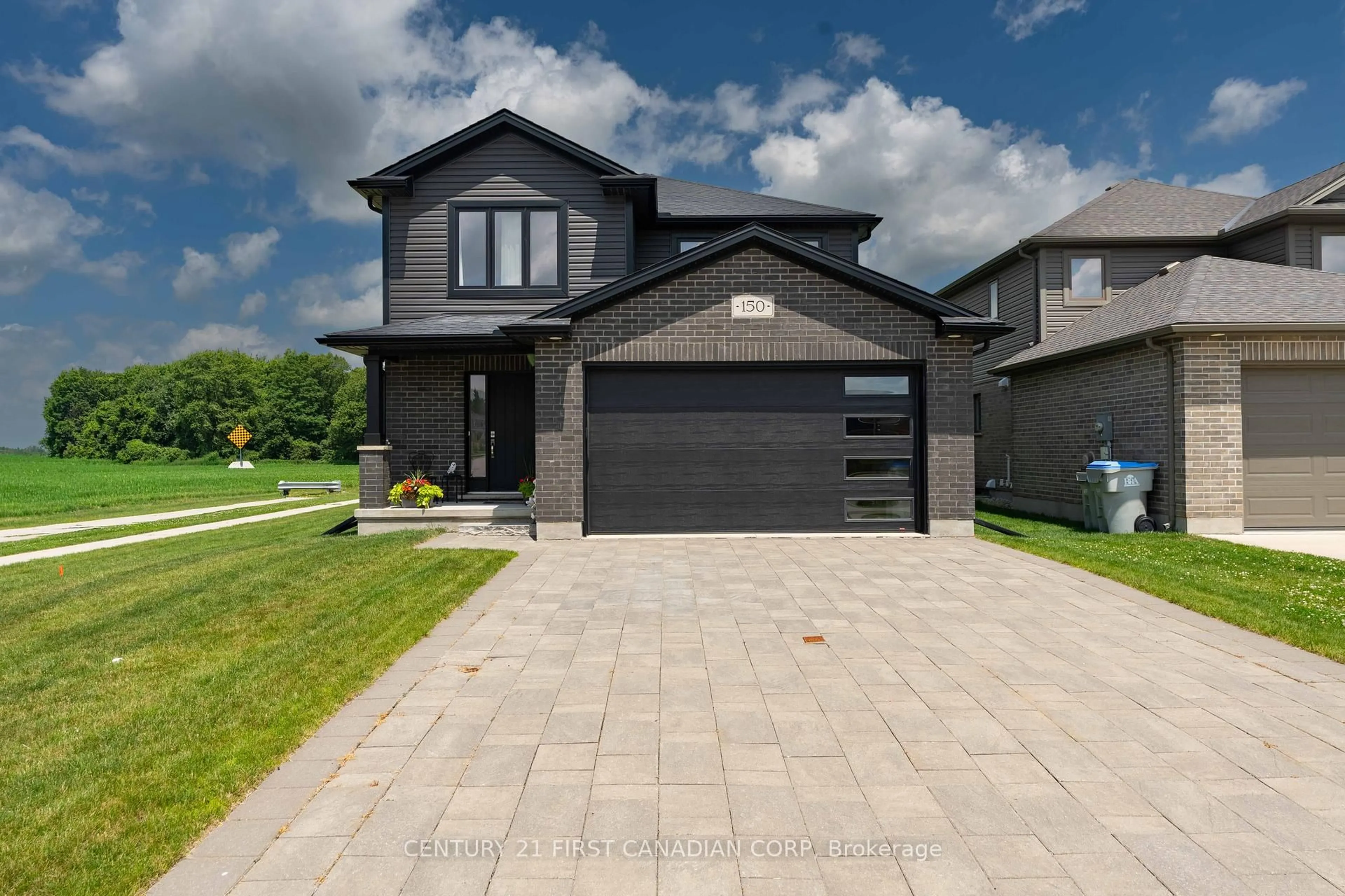 Home with brick exterior material, street for 150 Gilmour Dr, Lucan Biddulph Ontario N0M 2J0