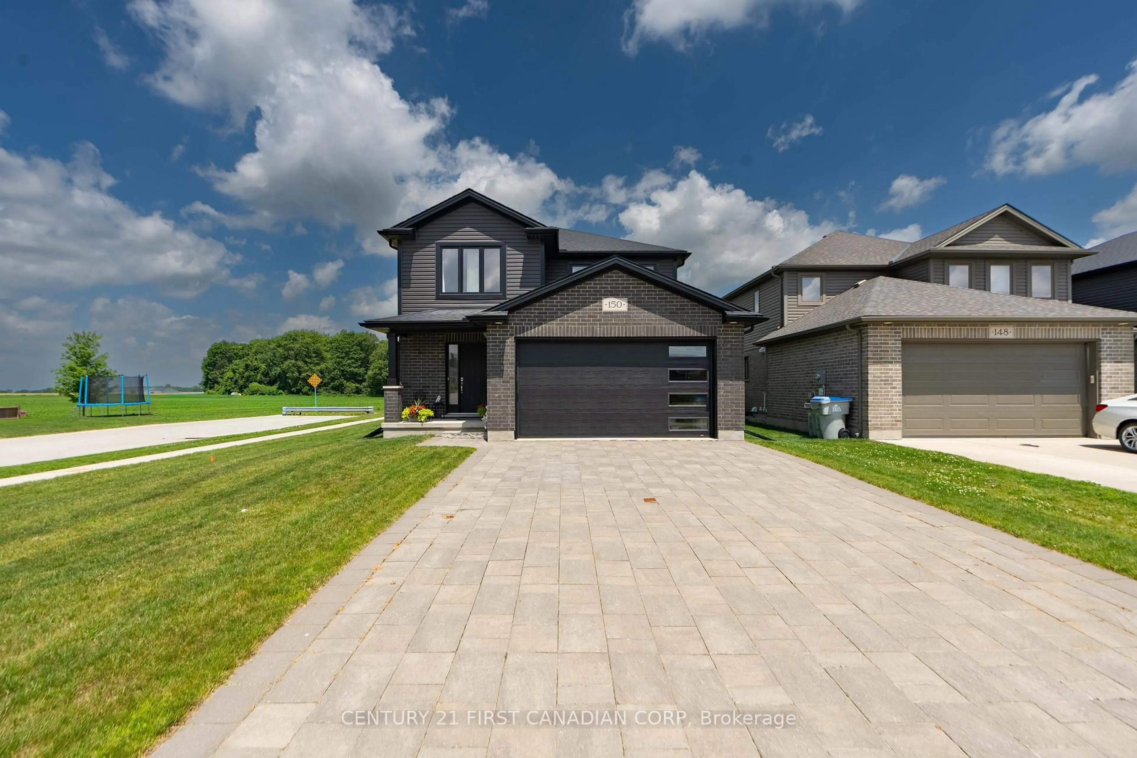 Home with brick exterior material, street for 150 Gilmour Dr, Lucan Biddulph Ontario N0M 2J0