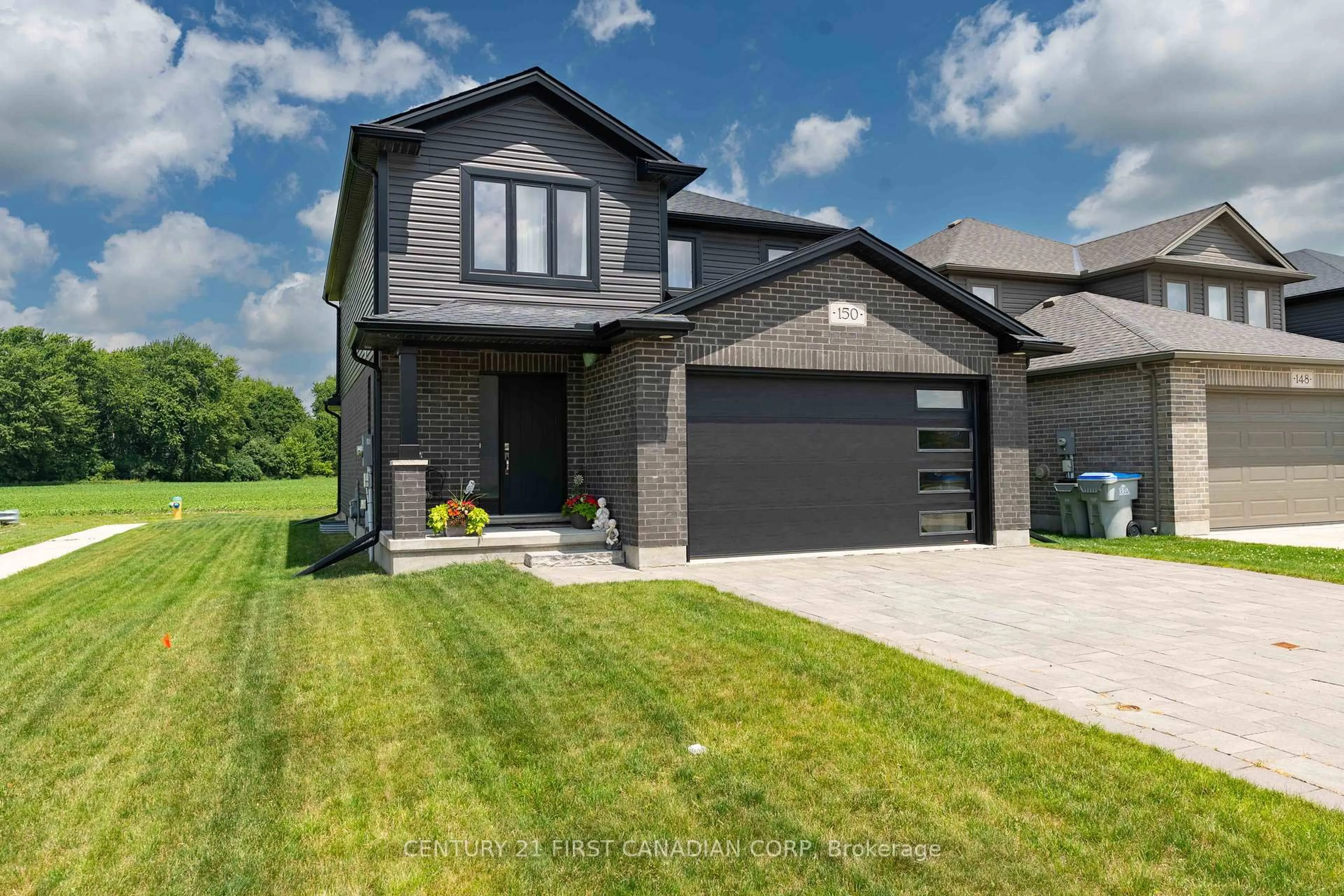 Home with brick exterior material, street for 150 Gilmour Dr, Lucan Biddulph Ontario N0M 2J0