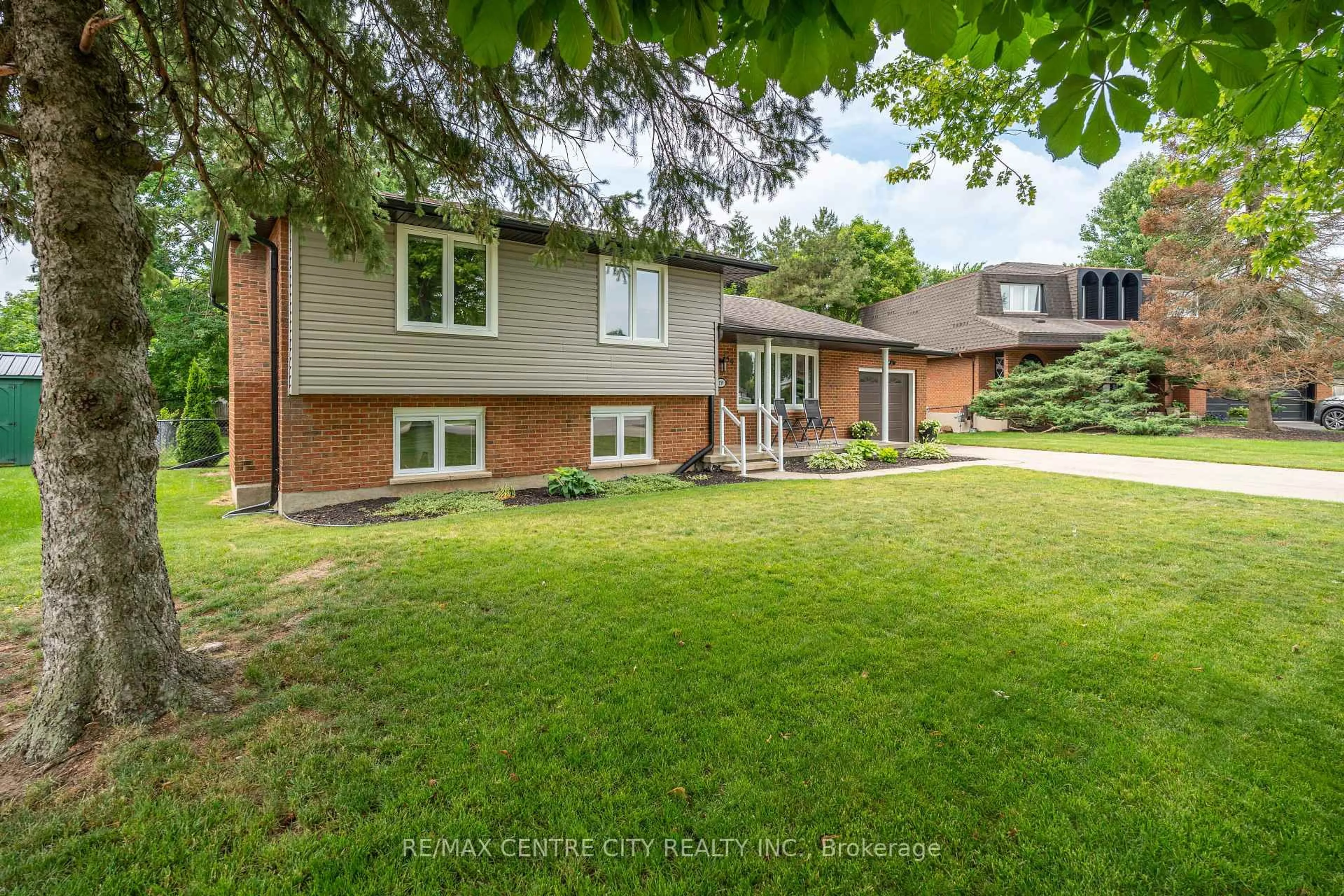 Home with brick exterior material, street for 159 Sherwood Cres, Thames Centre Ontario N0L 1G3