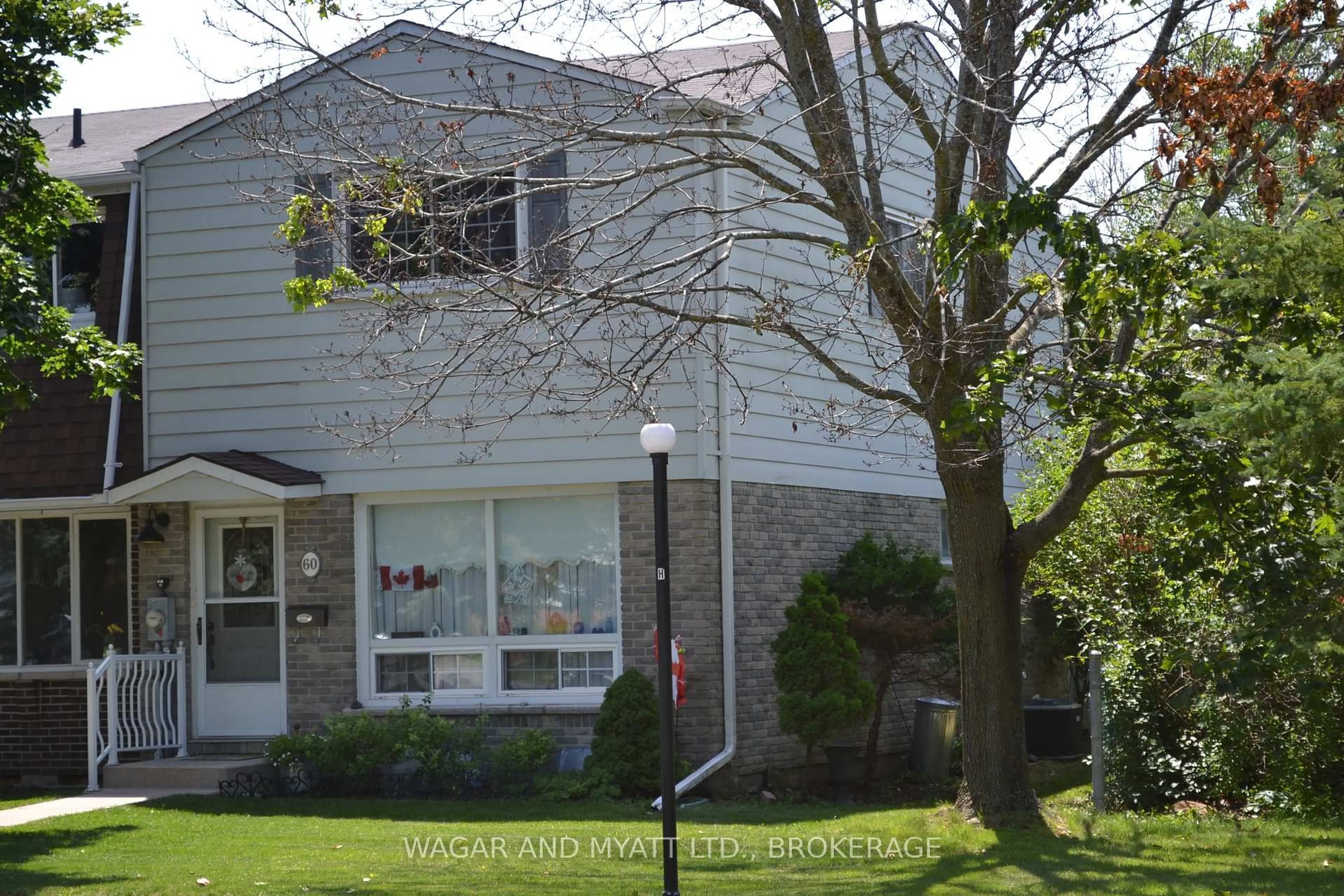 Home with vinyl exterior material, street for 60 Winchester Dr #30, Greater Napanee Ontario K7R 3R2
