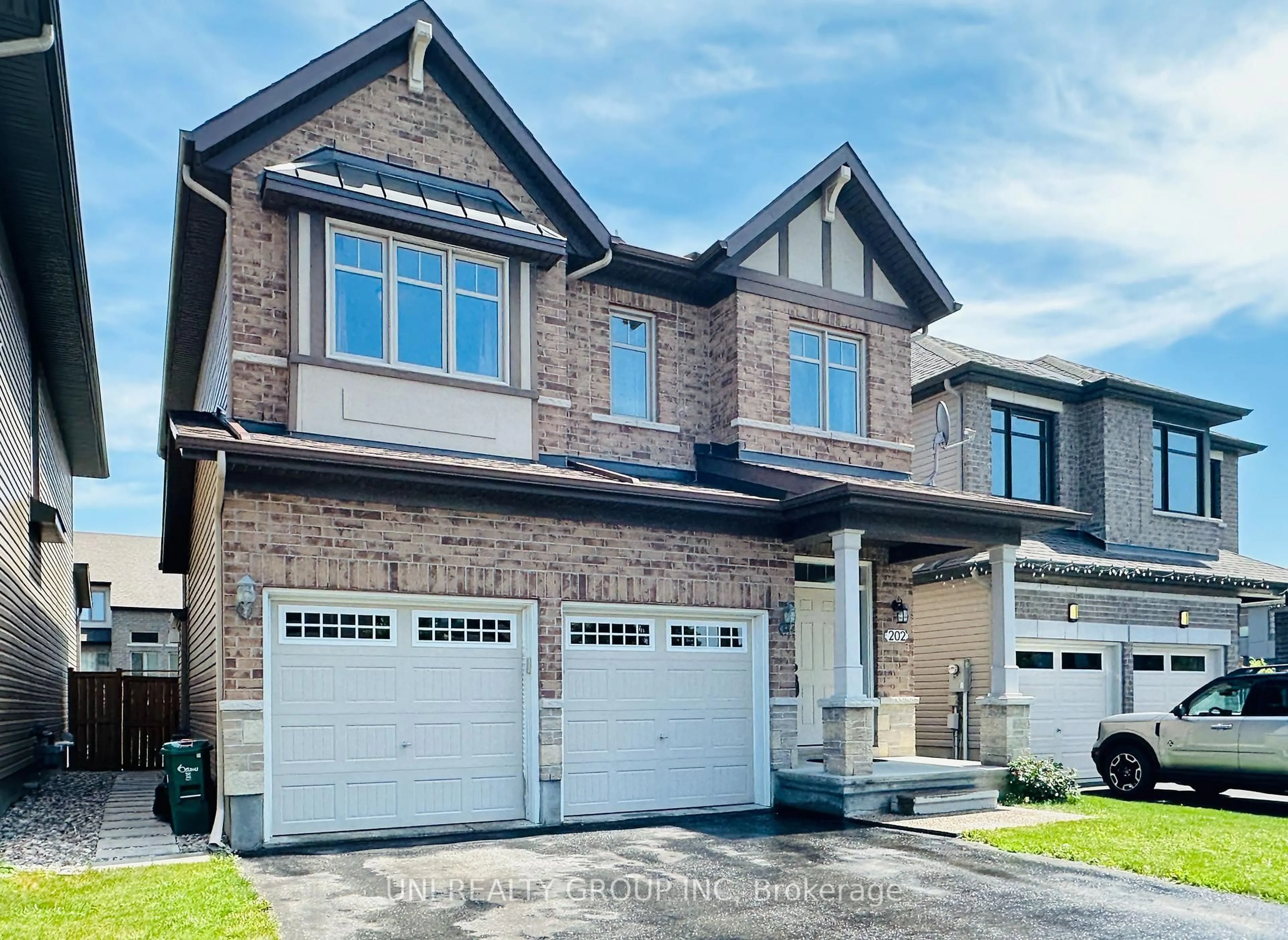 Home with brick exterior material, street for 202 Mareth Way, Ottawa Ontario K4M 0C9