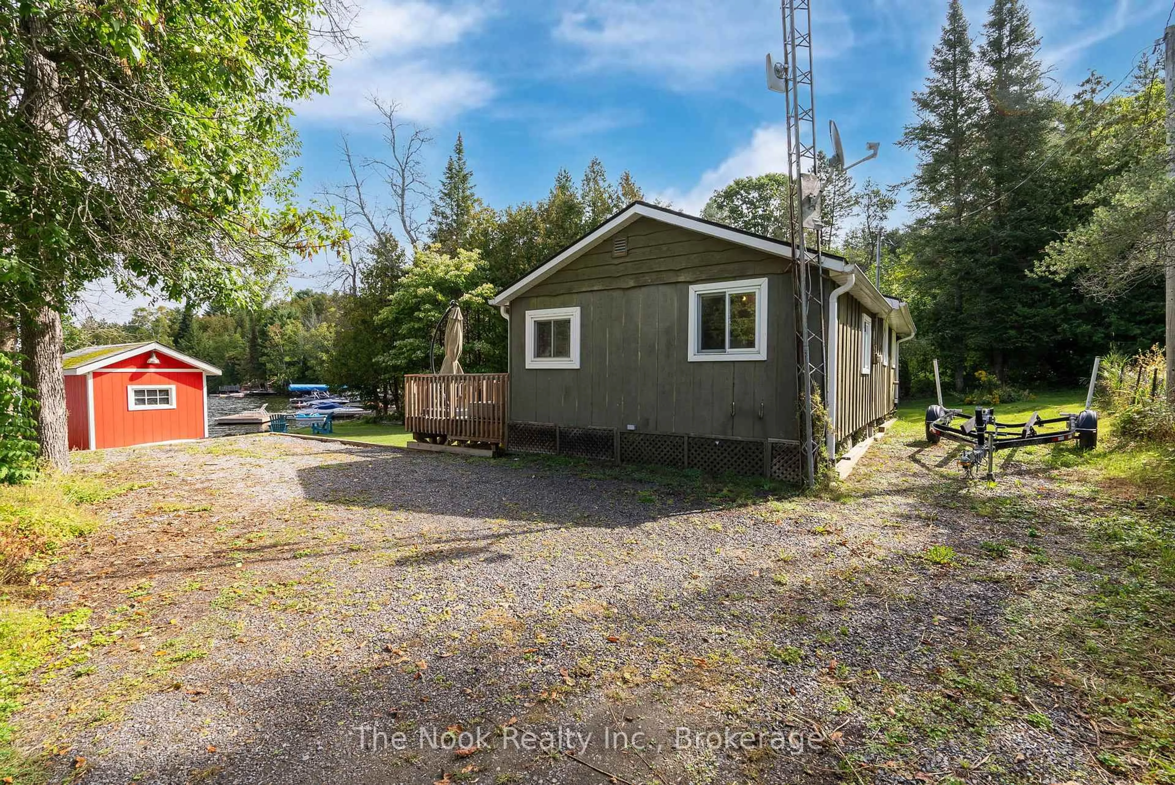 A pic from outside/outdoor area/front of a property/back of a property/a pic from drone, unknown for 37 Goldfinch Lane, North Kawartha Ontario K0L 1A0