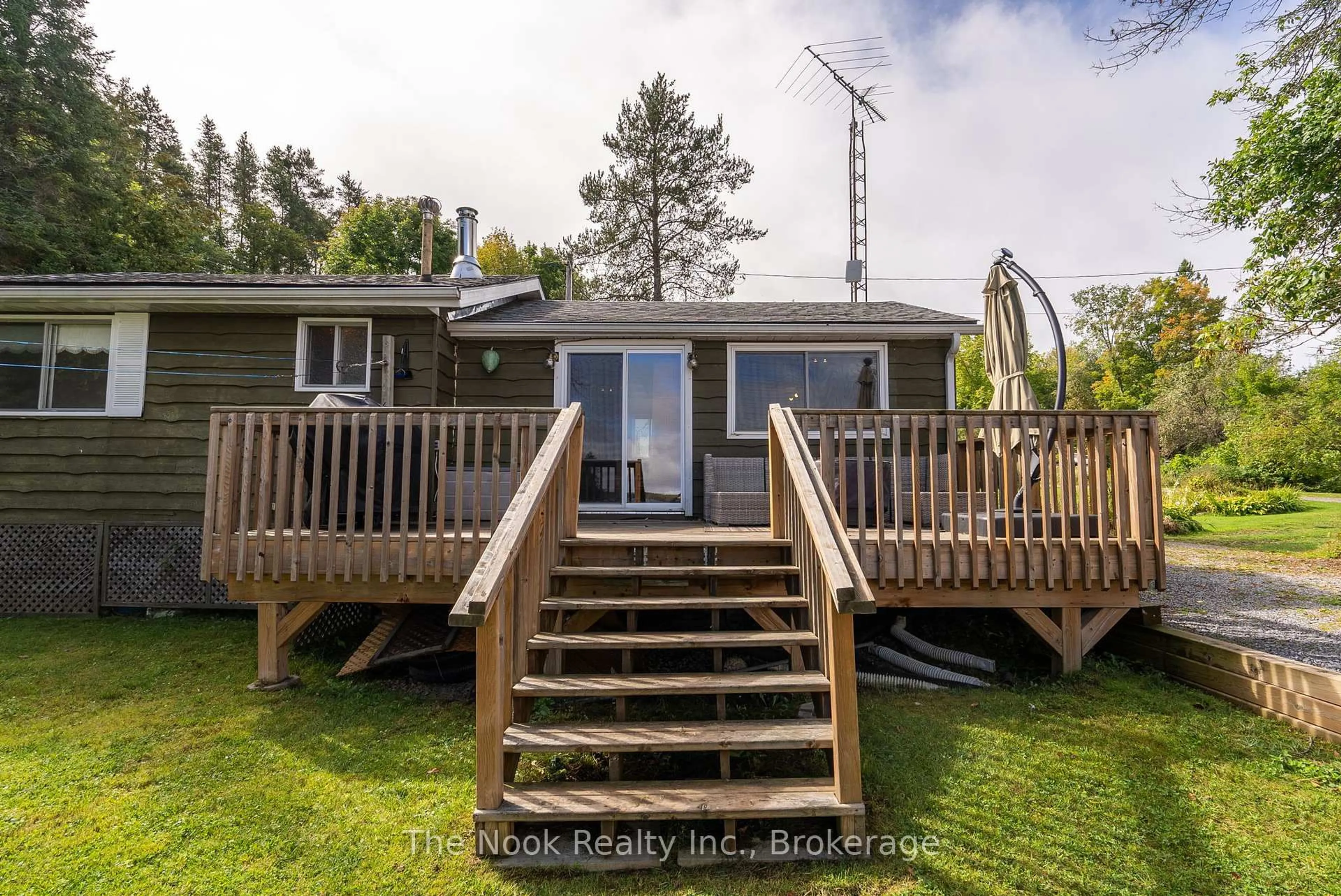 A pic from outside/outdoor area/front of a property/back of a property/a pic from drone, water/lake/river/ocean view for 37 Goldfinch Lane, North Kawartha Ontario K0L 1A0