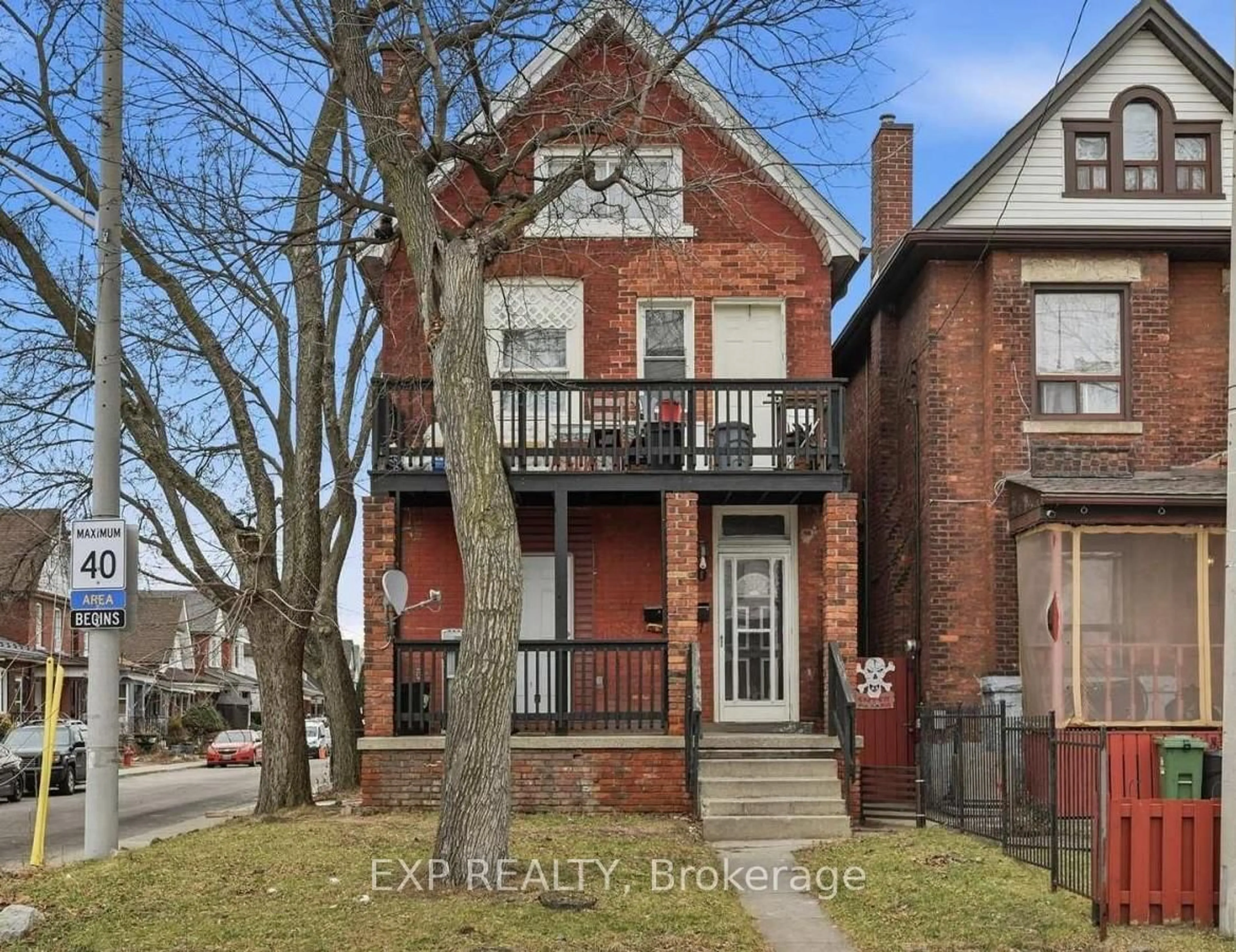 Home with brick exterior material, street for 90 Sherman Ave, Hamilton Ontario L8L 6M4