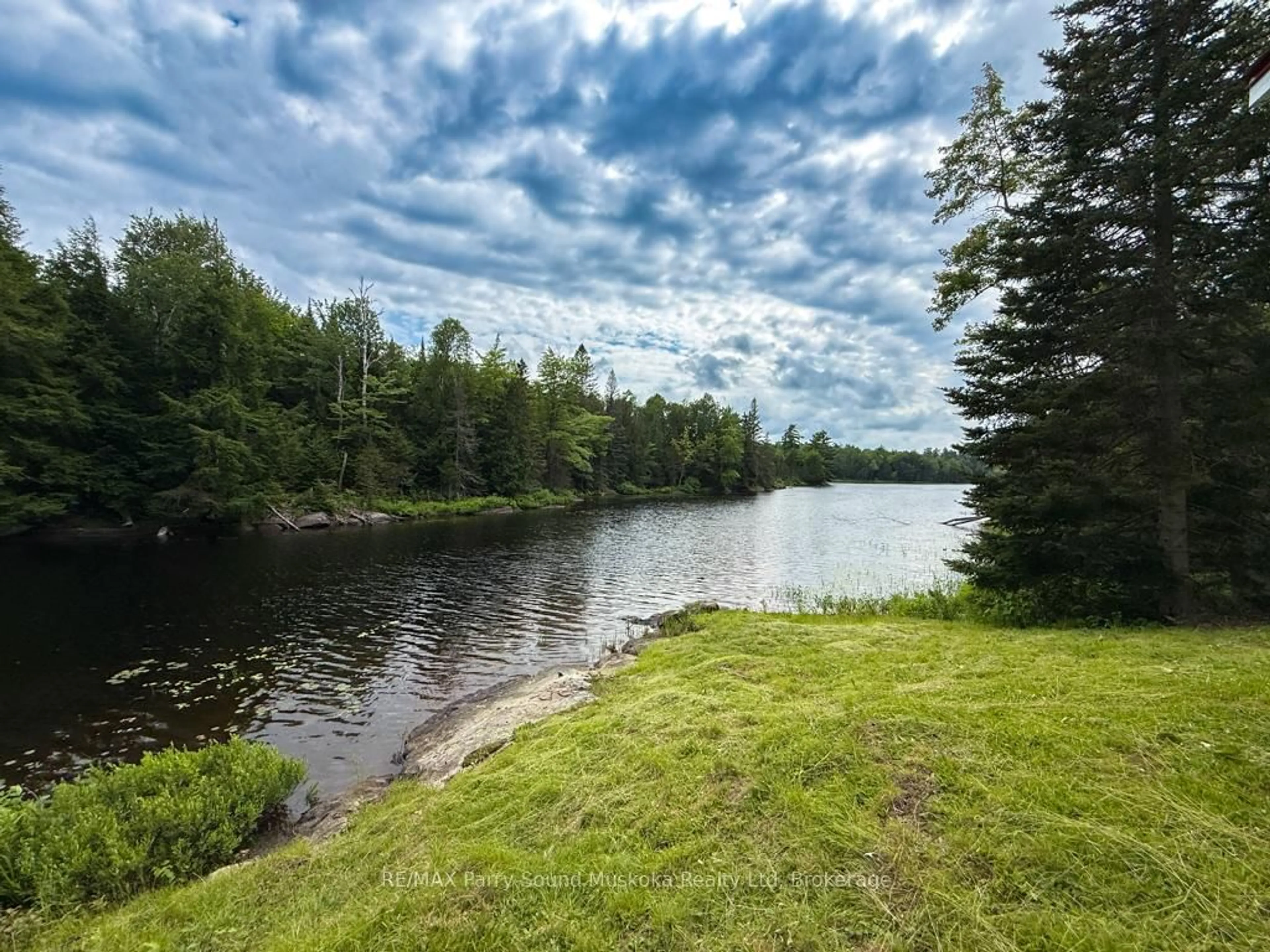 A pic from outside/outdoor area/front of a property/back of a property/a pic from drone, water/lake/river/ocean view for 14 Moose Lane, Whitestone Ontario P0A 1G0