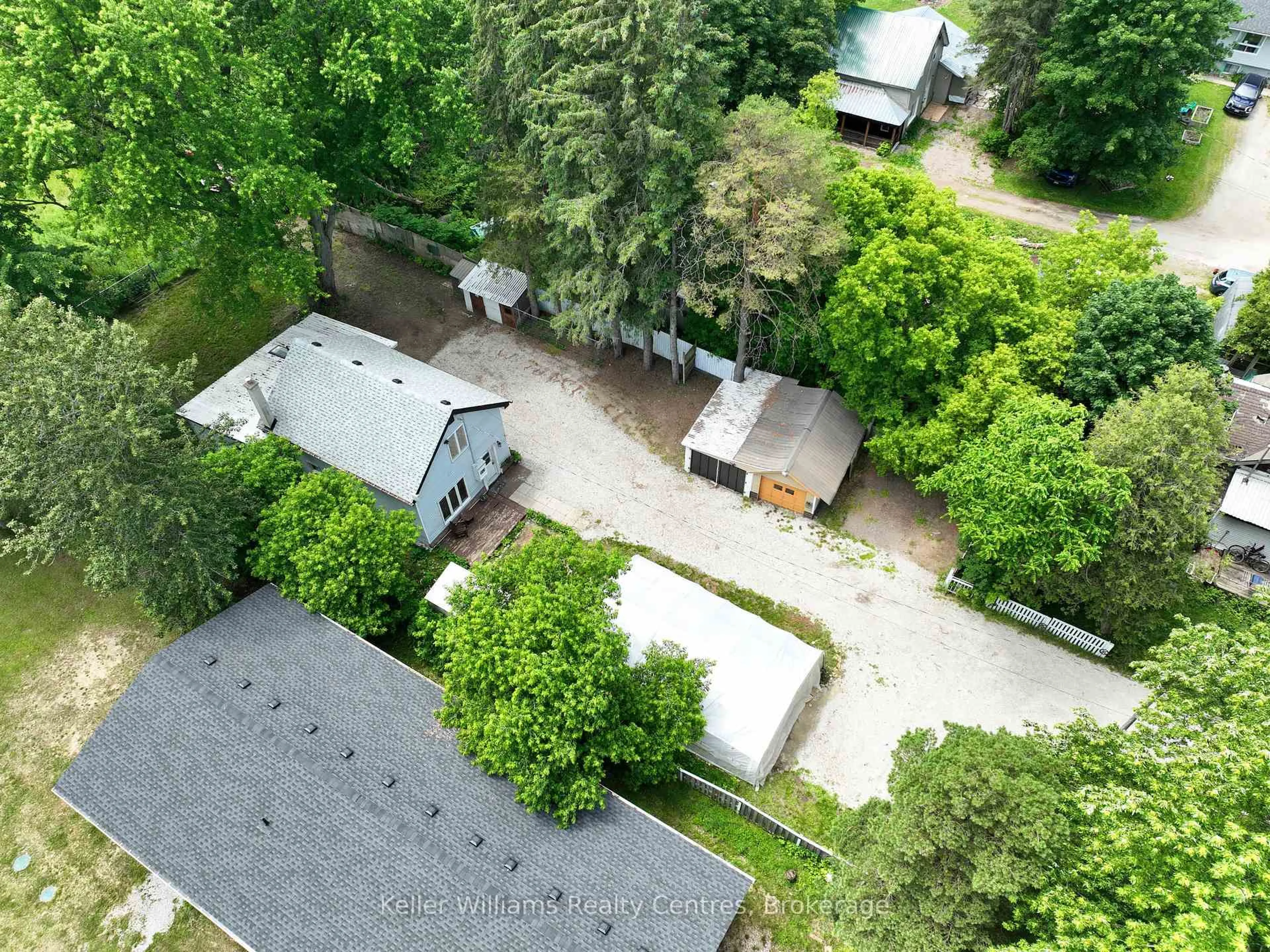 A pic from outside/outdoor area/front of a property/back of a property/a pic from drone, street for 243 Queen St, South Bruce Peninsula Ontario N0H 1P0