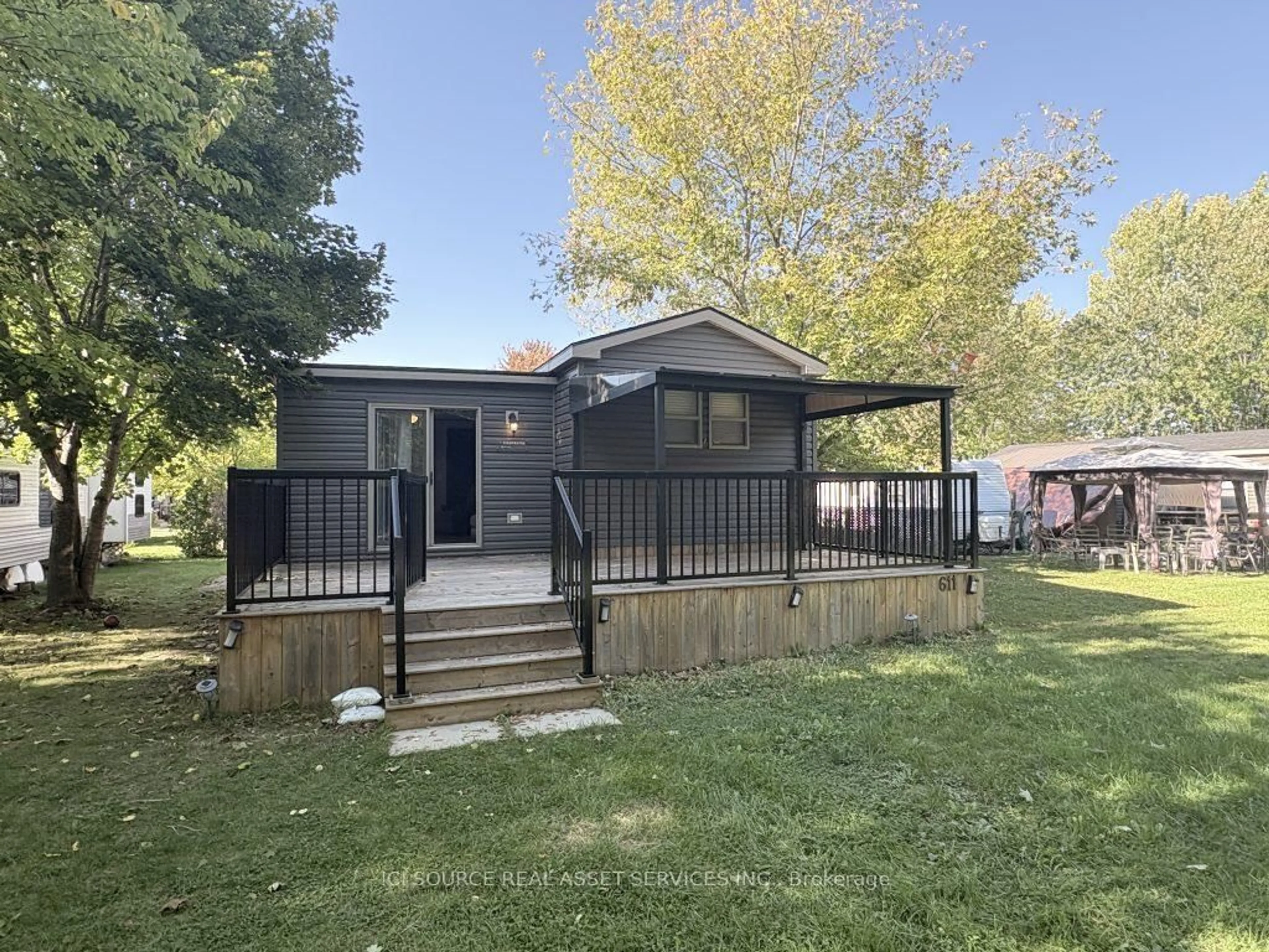 Home with vinyl exterior material, street for 7100 County Rd 18 #SBR611, Alnwick/Haldimand Ontario K0K 2X0