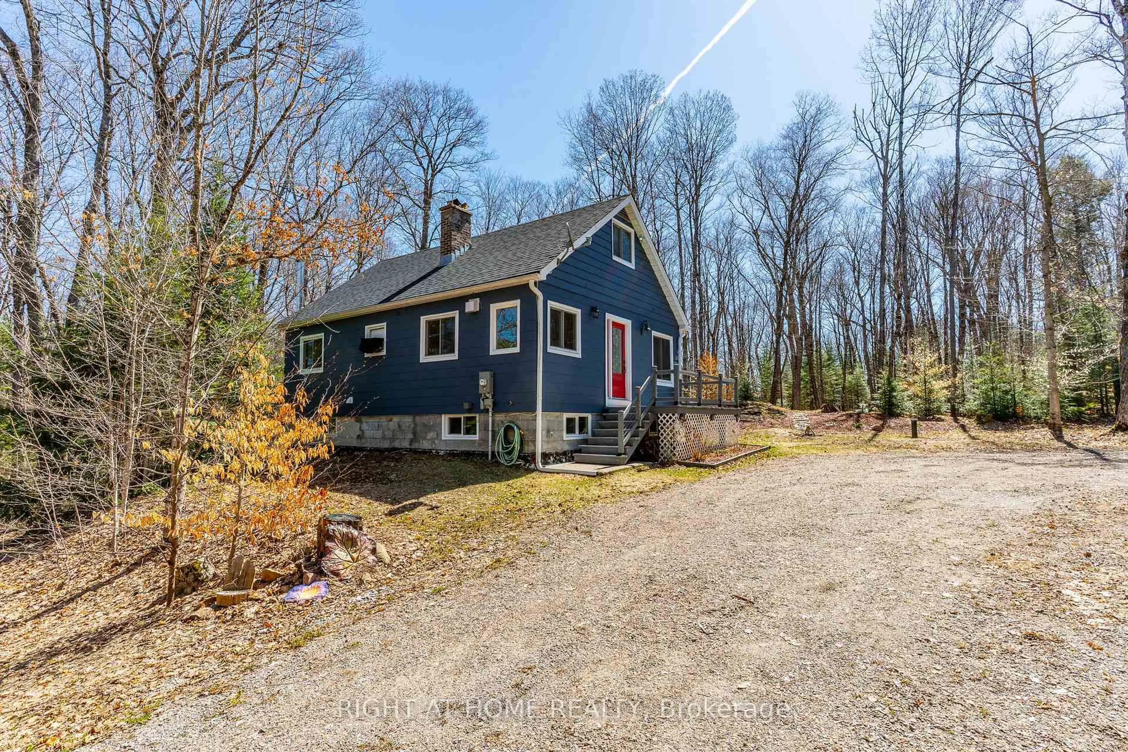 A pic from outside/outdoor area/front of a property/back of a property/a pic from drone, street for 1066 Loop Rd, Highlands East Ontario K0L 1C0