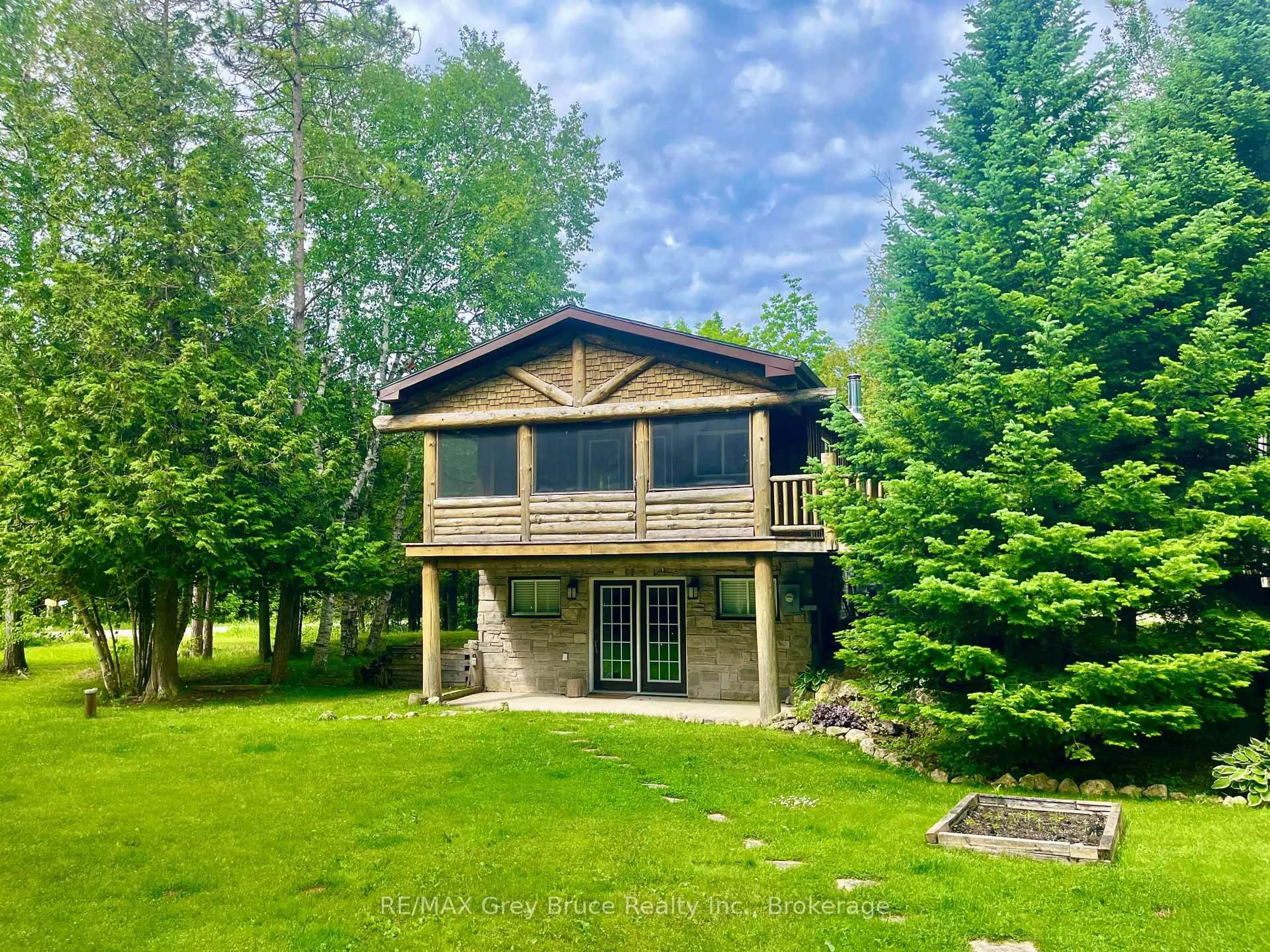 A pic from outside/outdoor area/front of a property/back of a property/a pic from drone, water/lake/river/ocean view for 1535 15 Sdrd, South Bruce Peninsula Ontario N0H 2T0