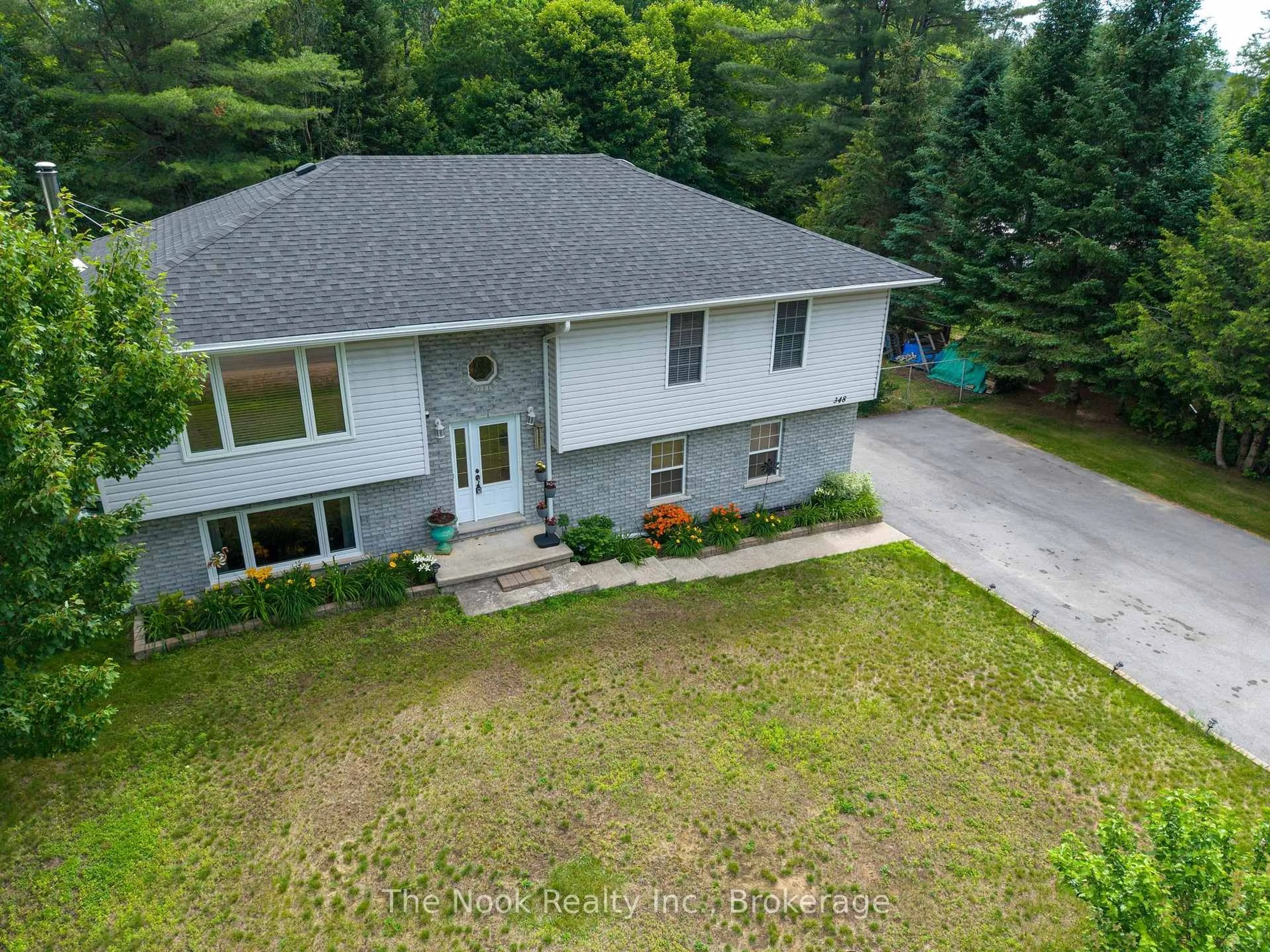 A pic from outside/outdoor area/front of a property/back of a property/a pic from drone, unknown for 348 Chemaushgon Rd, Bancroft Ontario K0L 1C0