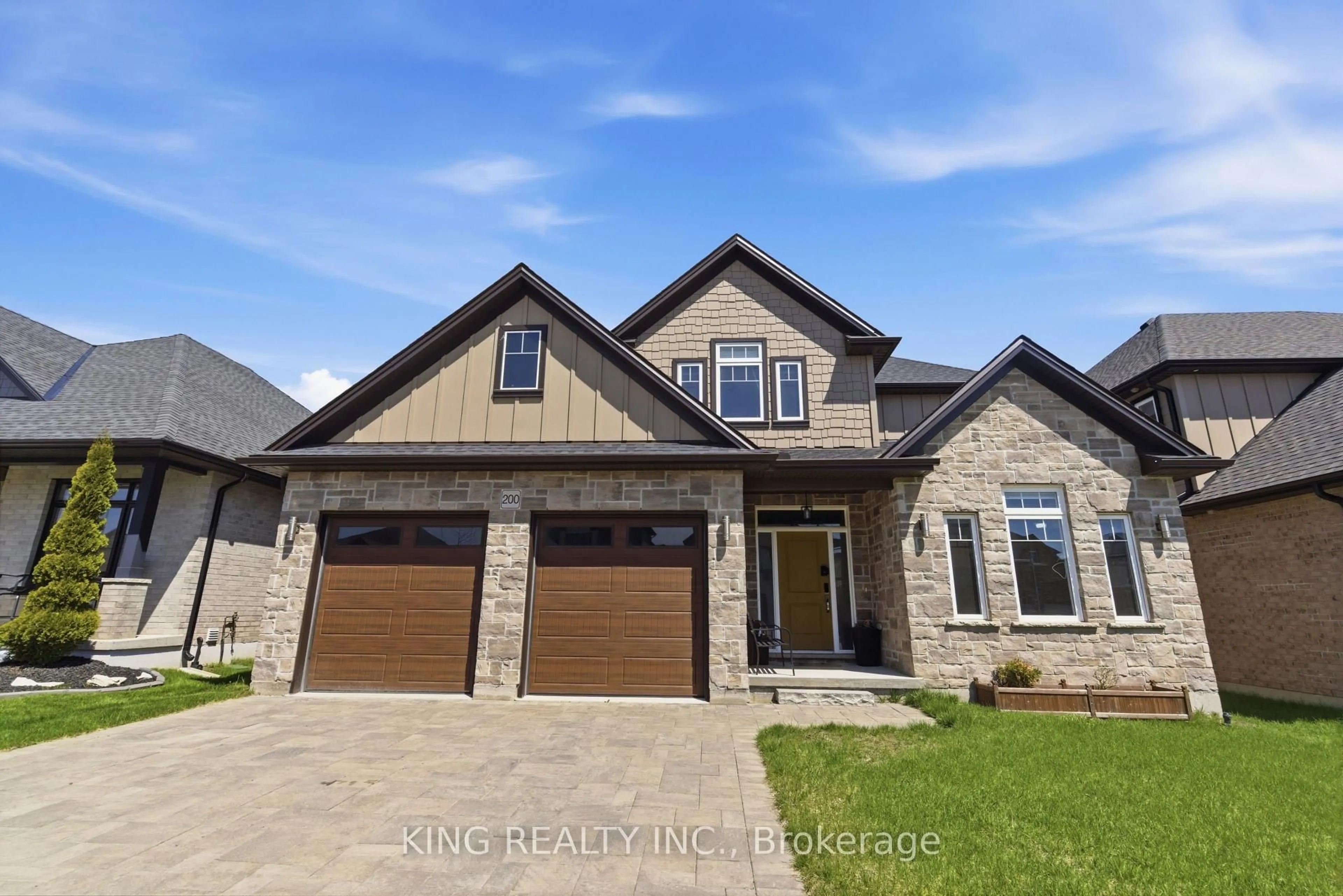 Home with brick exterior material, street for 200 BOARDWALK Way, Thames Centre Ontario N0L 1G2