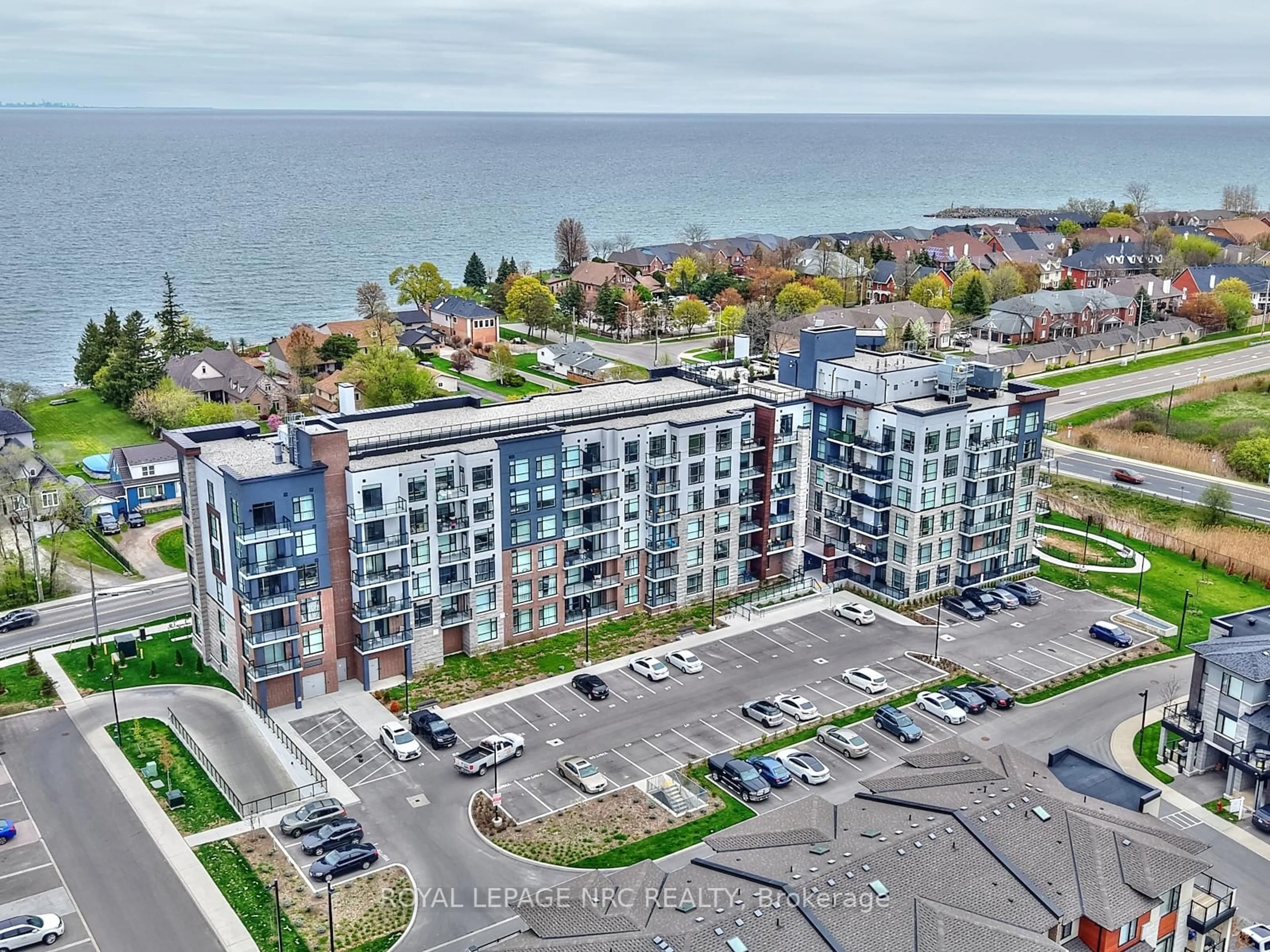 A pic from outside/outdoor area/front of a property/back of a property/a pic from drone, water/lake/river/ocean view for 600 North Service Rd #221, Hamilton Ontario L8E 0L2