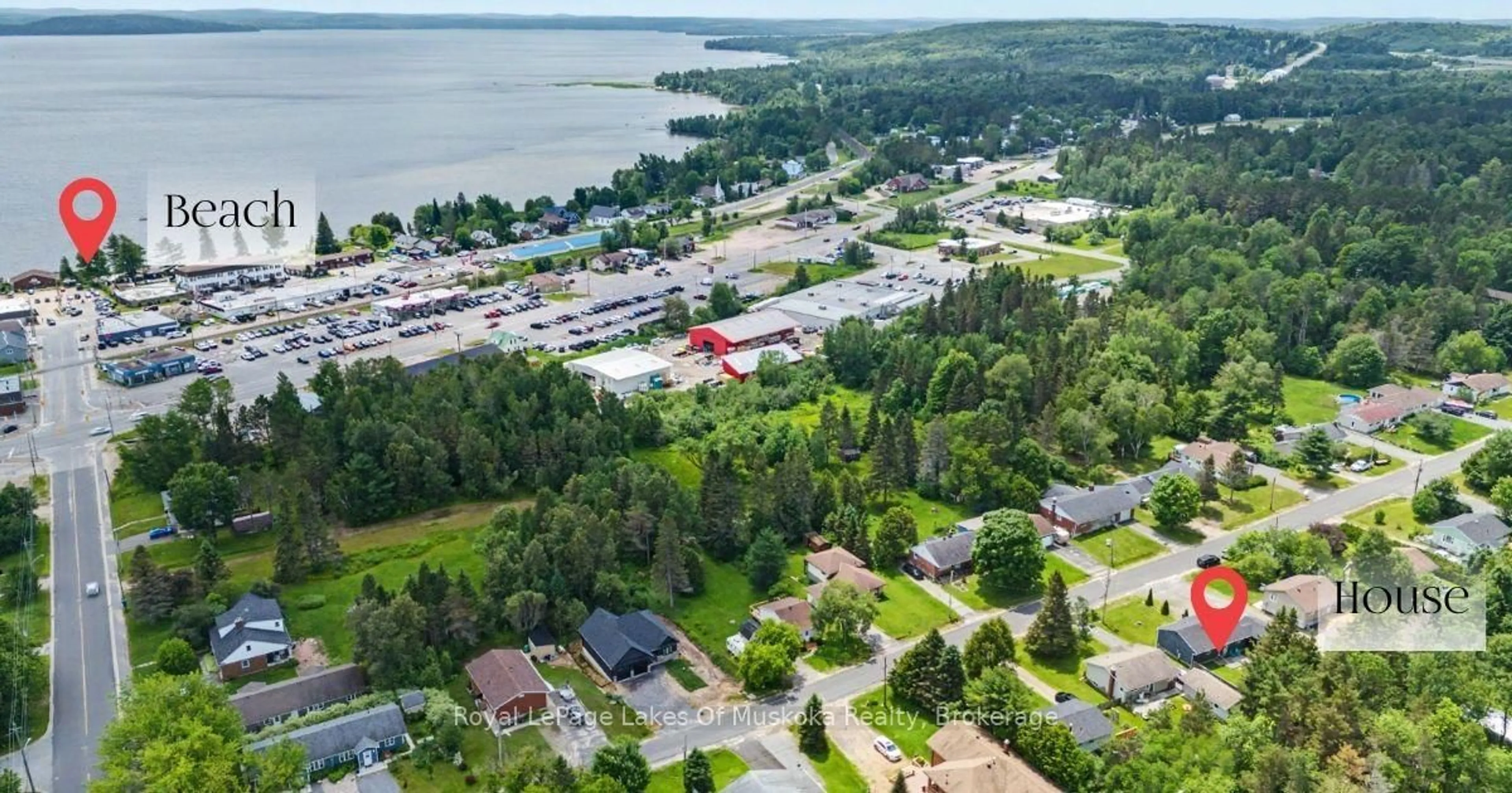 A pic from outside/outdoor area/front of a property/back of a property/a pic from drone, water/lake/river/ocean view for 34 Queen St, Sundridge Ontario P0A 1Z0